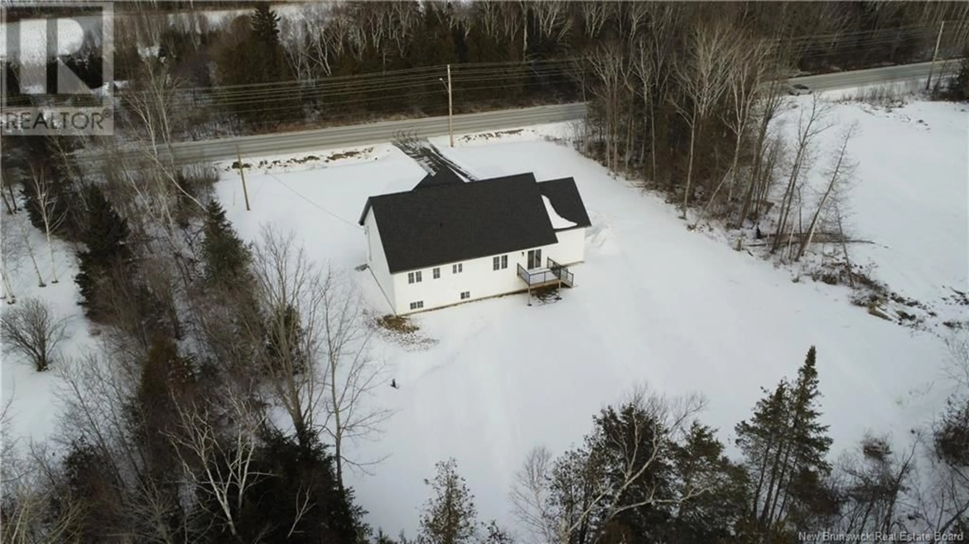 A pic from outside/outdoor area/front of a property/back of a property/a pic from drone, unknown for 2215 Sunset Drive, Bathurst New Brunswick E2A7K8