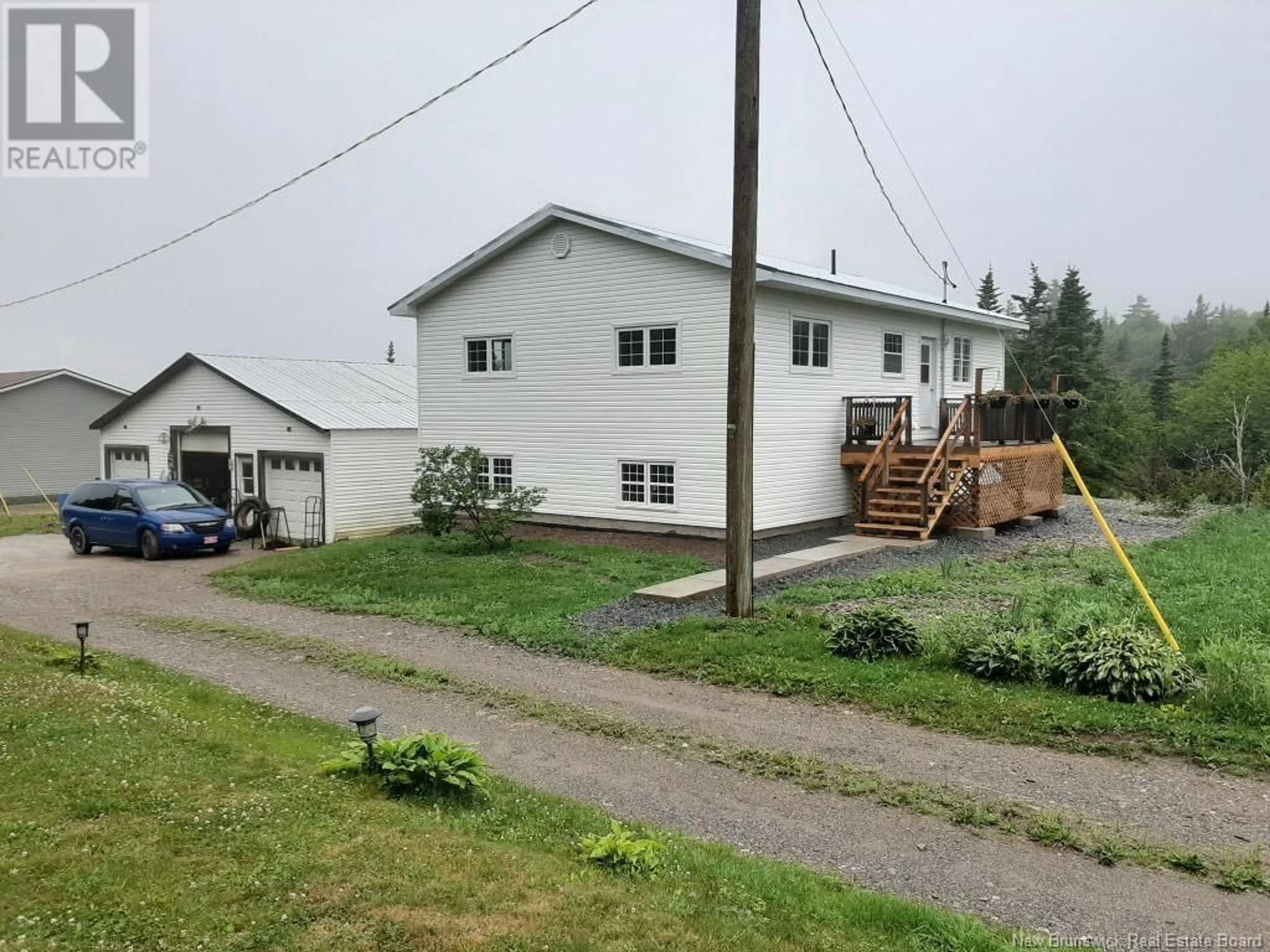 A pic from outside/outdoor area/front of a property/back of a property/a pic from drone, building for 15 Hawk Hill Lane, Mispec New Brunswick E2J4W3