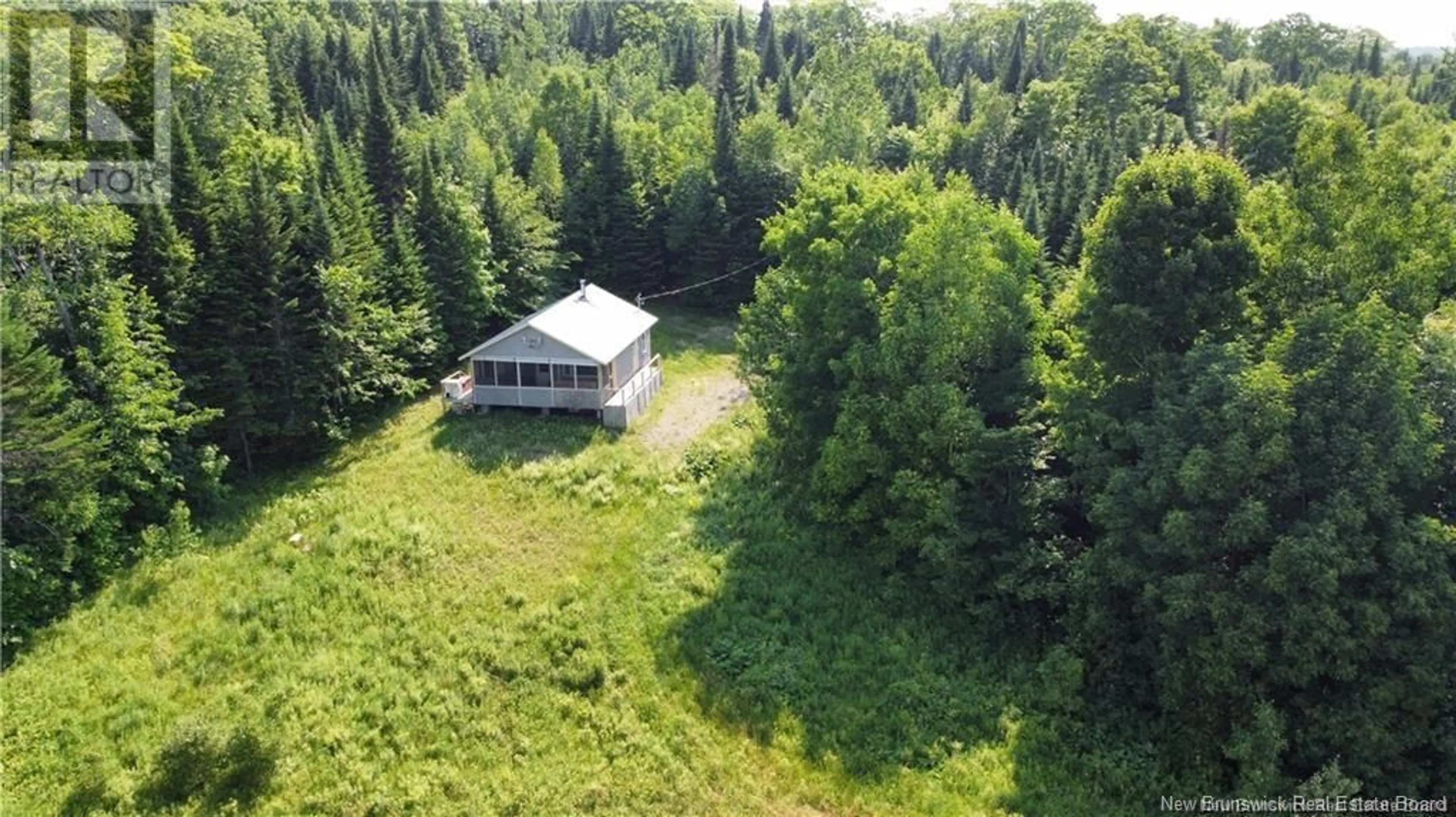 A pic from outside/outdoor area/front of a property/back of a property/a pic from drone, forest/trees view for 0 Sharkey Road, Jacksonville New Brunswick E3C1W7