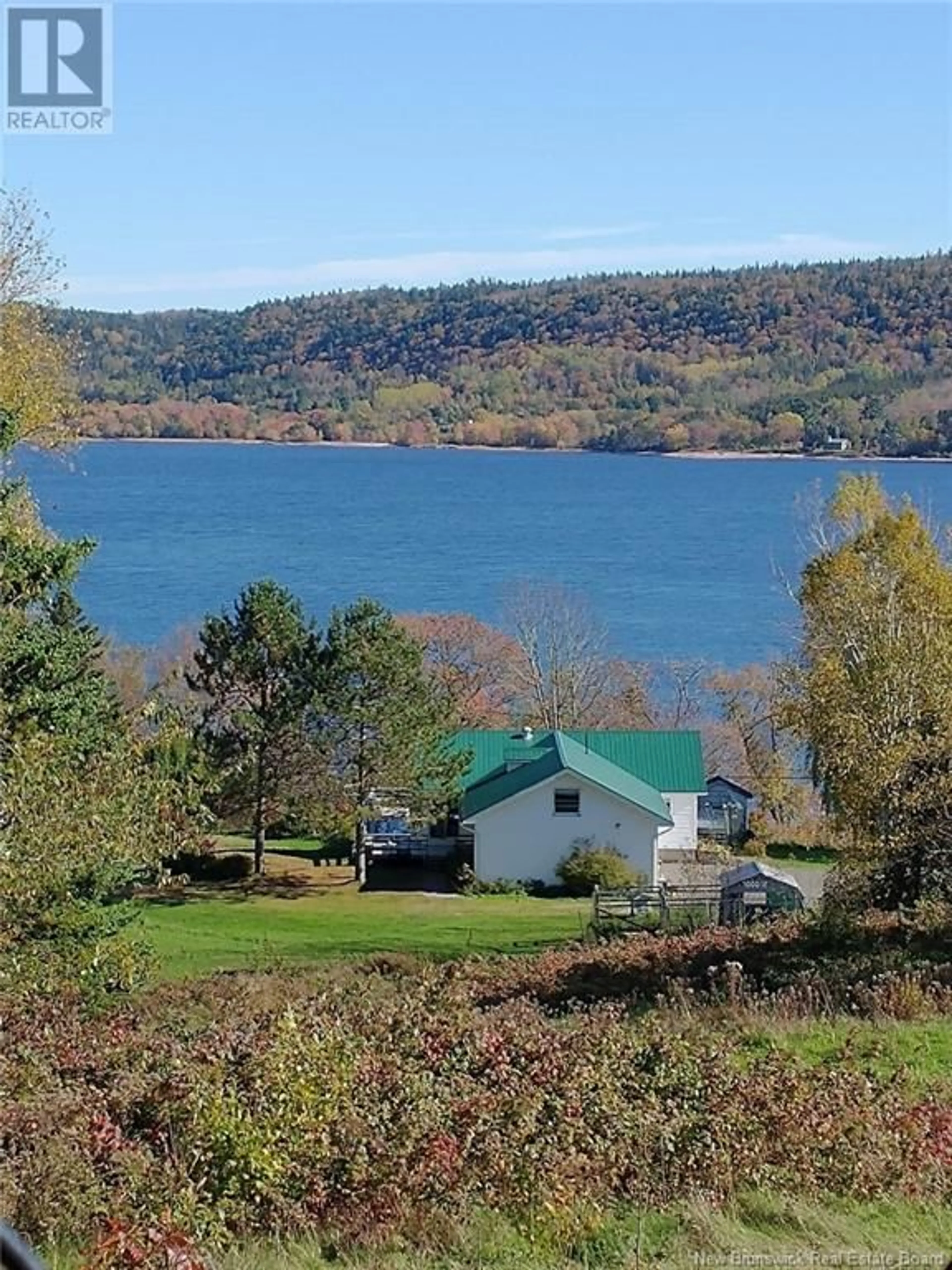 A pic from outside/outdoor area/front of a property/back of a property/a pic from drone, water/lake/river/ocean view for 2588 Route 124, Kars New Brunswick E5T2W4