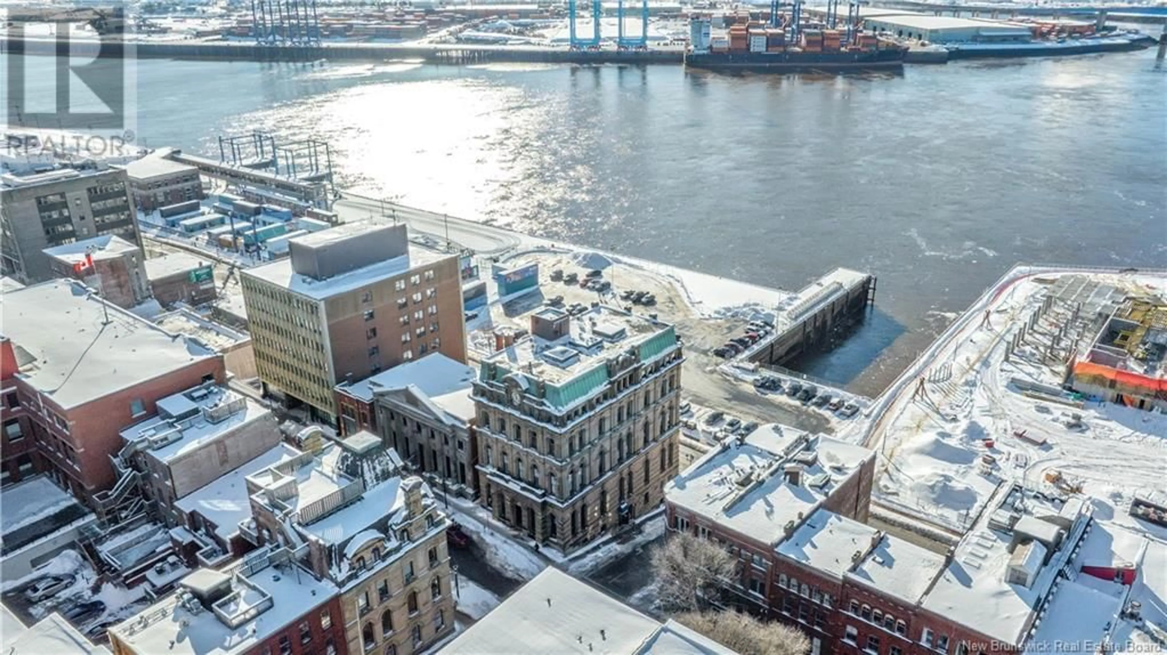 A pic from outside/outdoor area/front of a property/back of a property/a pic from drone, city buildings view from balcony for 115 Prince William Street Unit# 201, Saint John New Brunswick E2L2L3