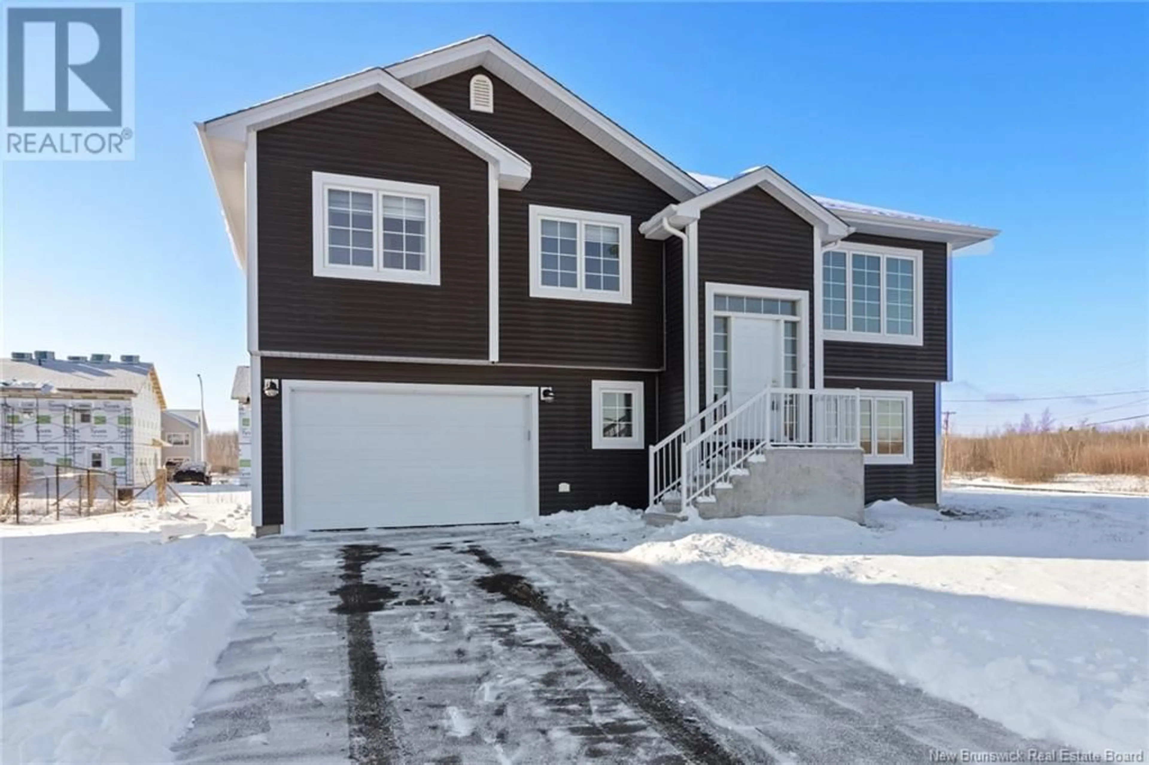 Home with vinyl exterior material, street for 2 Burnett Street, Oromocto New Brunswick E2V0J4