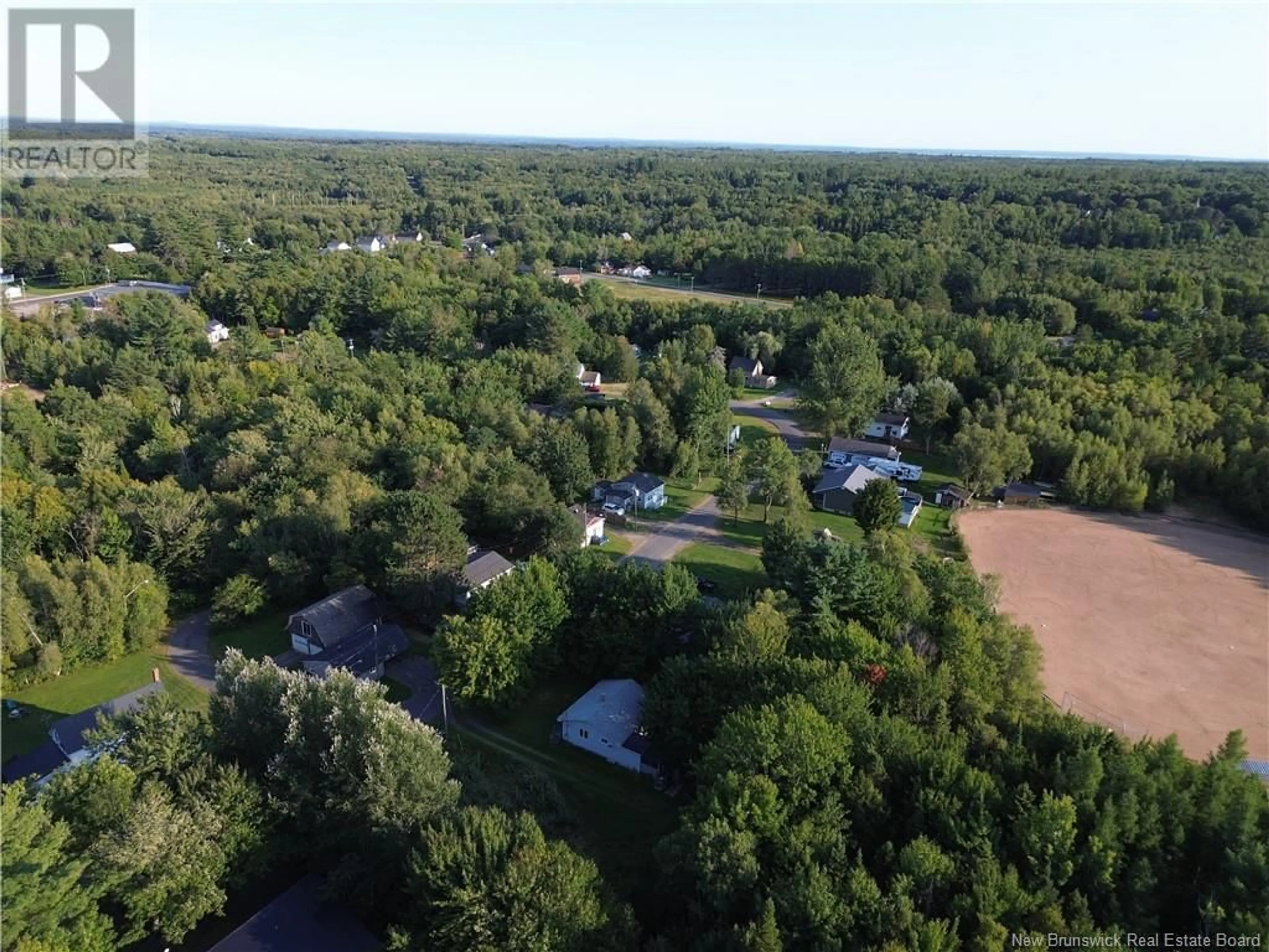 A pic from outside/outdoor area/front of a property/back of a property/a pic from drone, forest/trees view for 95 Diamond Drive, Minto New Brunswick E3B2Y6