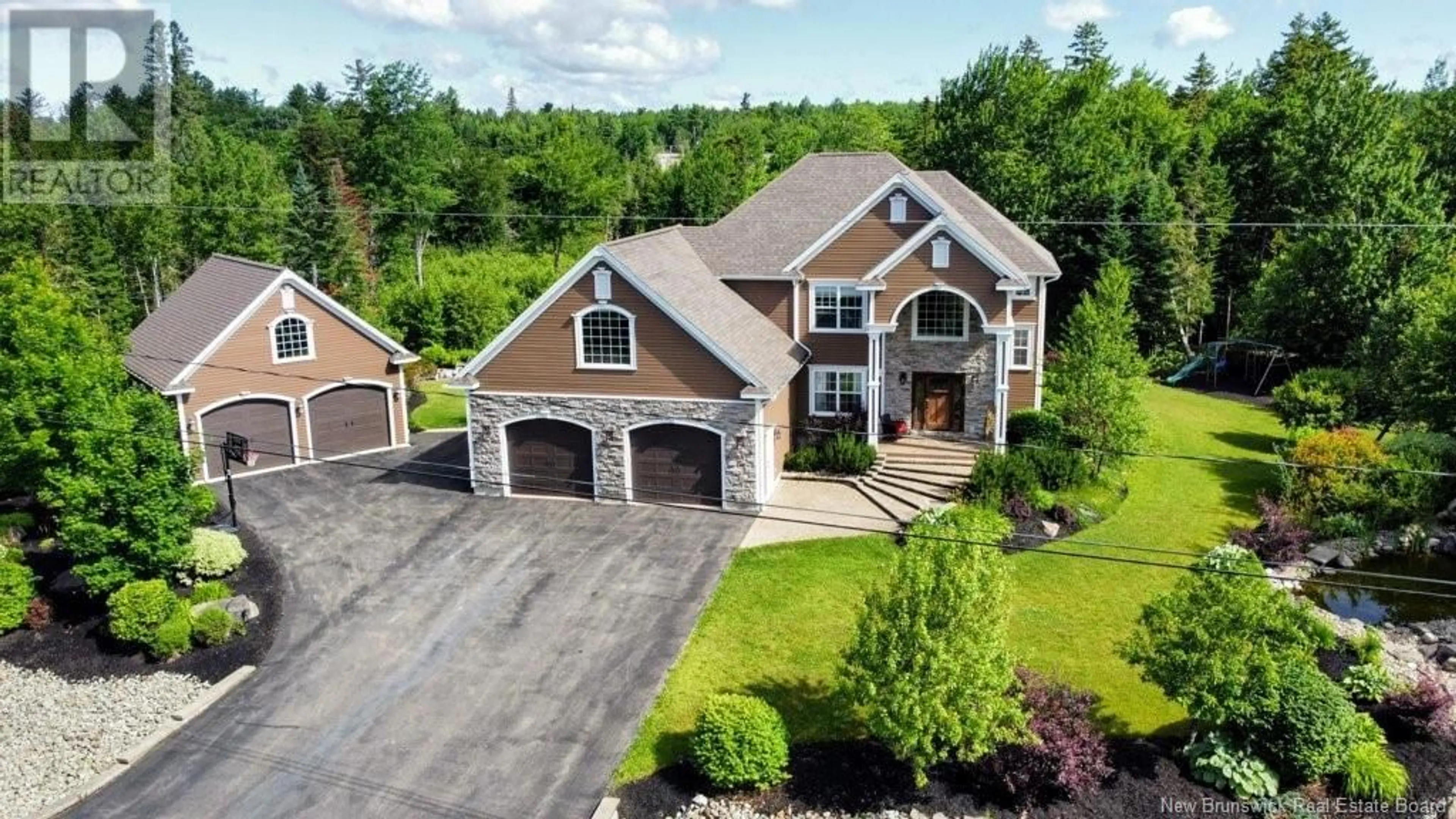 A pic from outside/outdoor area/front of a property/back of a property/a pic from drone, street for 4 Blue Jay Court, Hanwell New Brunswick E3B0H3