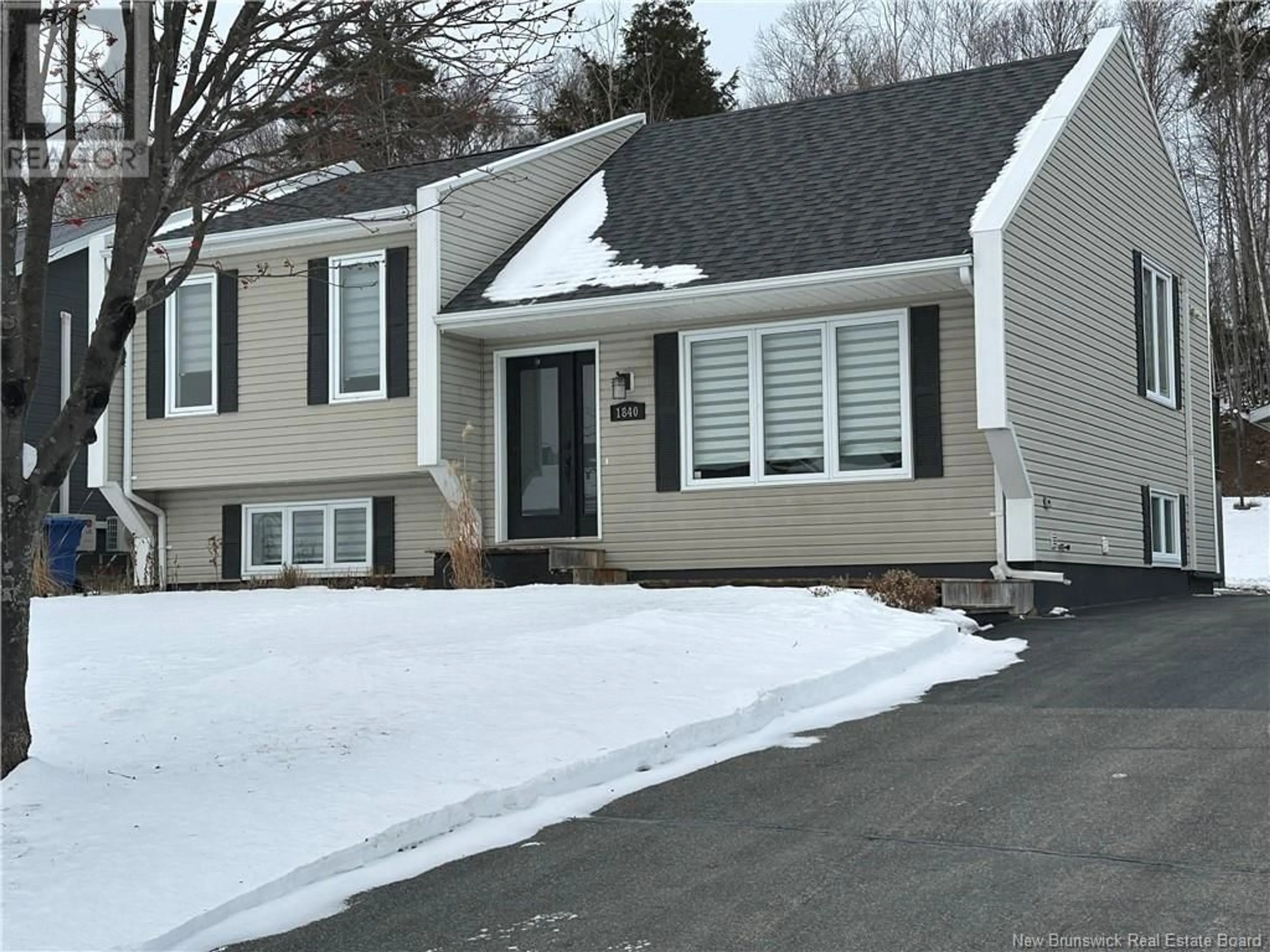 Home with vinyl exterior material, street for 1840 Gowan Brae, Bathurst New Brunswick E2A4X5