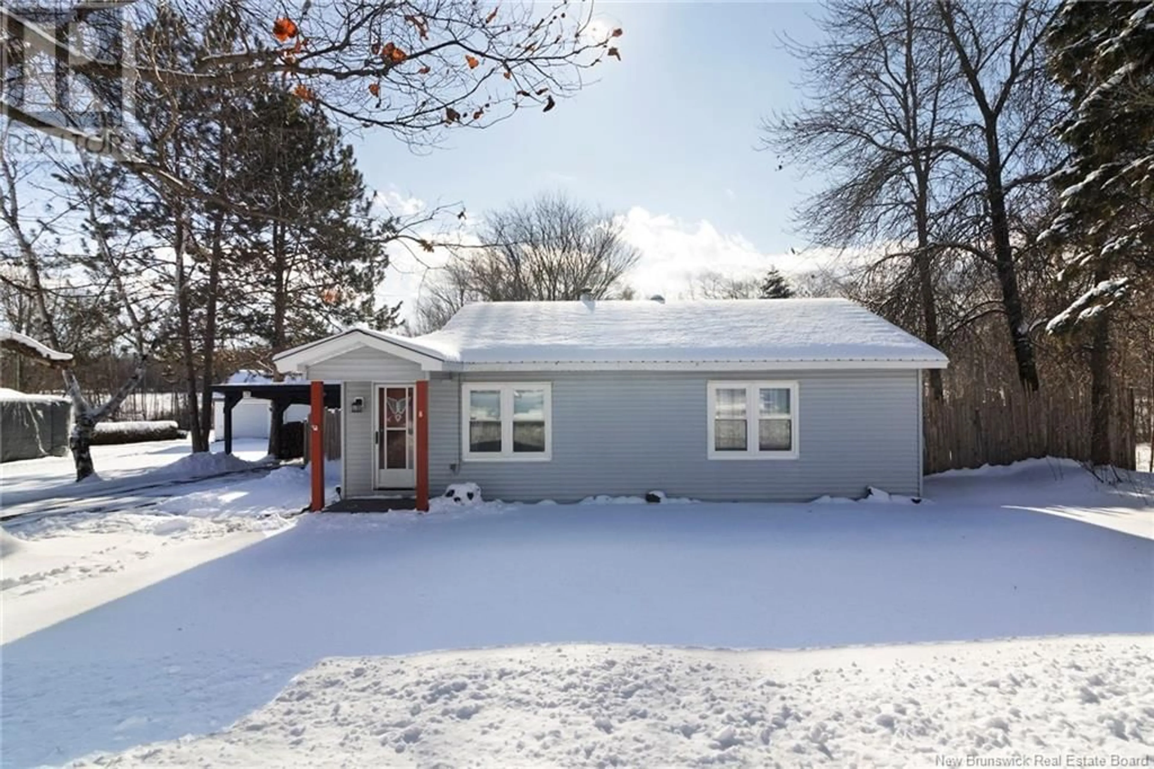 Home with vinyl exterior material, street for 8 Wharf Road, Newcastle Creek New Brunswick E4B2J7