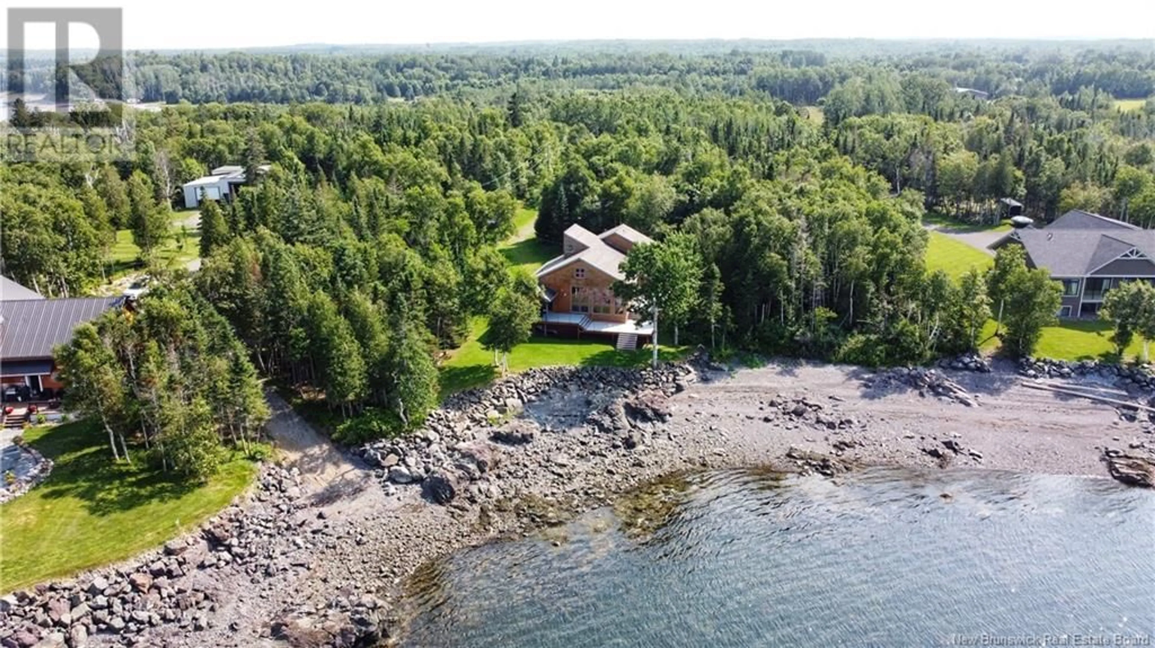 A pic from outside/outdoor area/front of a property/back of a property/a pic from drone, water/lake/river/ocean view for 25 Island View Lane, Sea Side New Brunswick E8G0A7