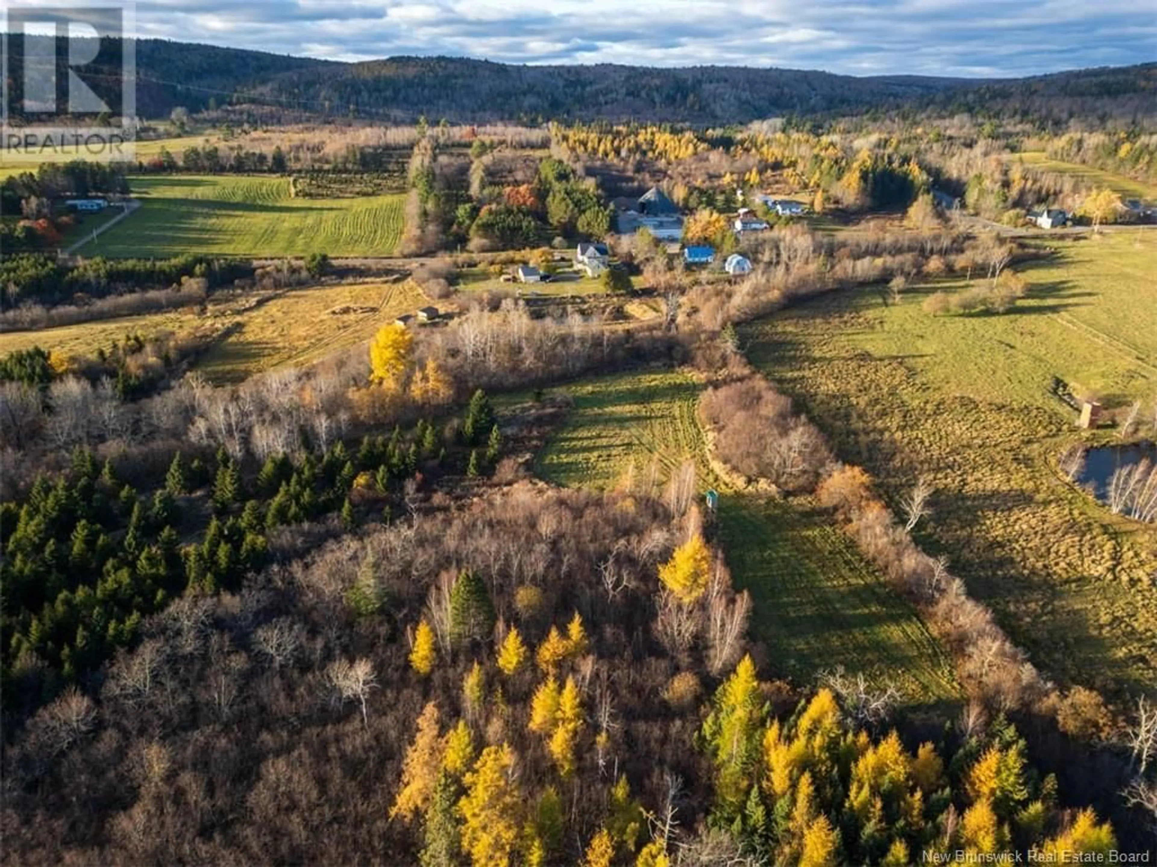 A pic from outside/outdoor area/front of a property/back of a property/a pic from drone, forest/trees view for 1701 Route 124, Springfield New Brunswick E5T2J9