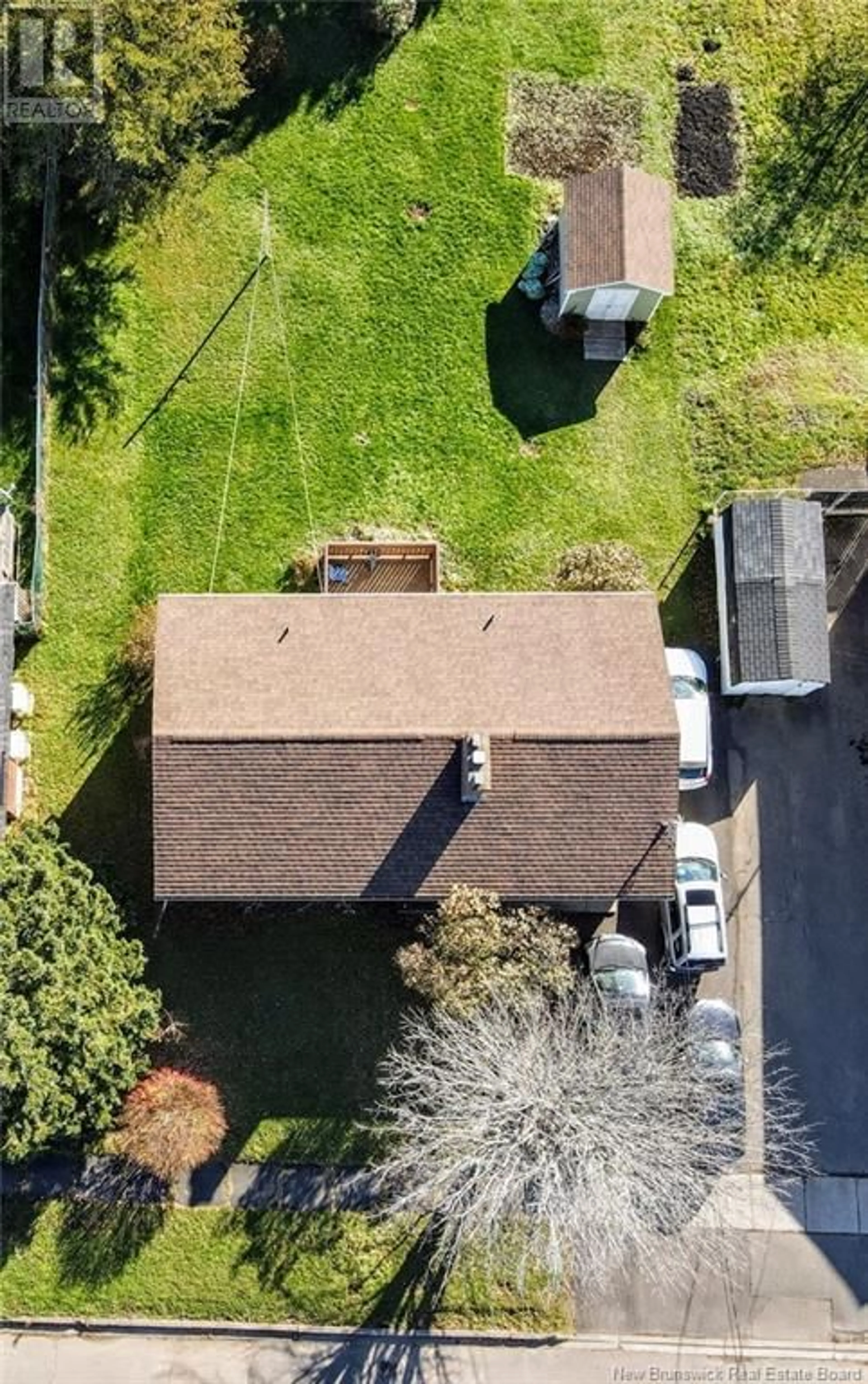 A pic from outside/outdoor area/front of a property/back of a property/a pic from drone, street for 36 Kelly, Moncton New Brunswick E1A3R8