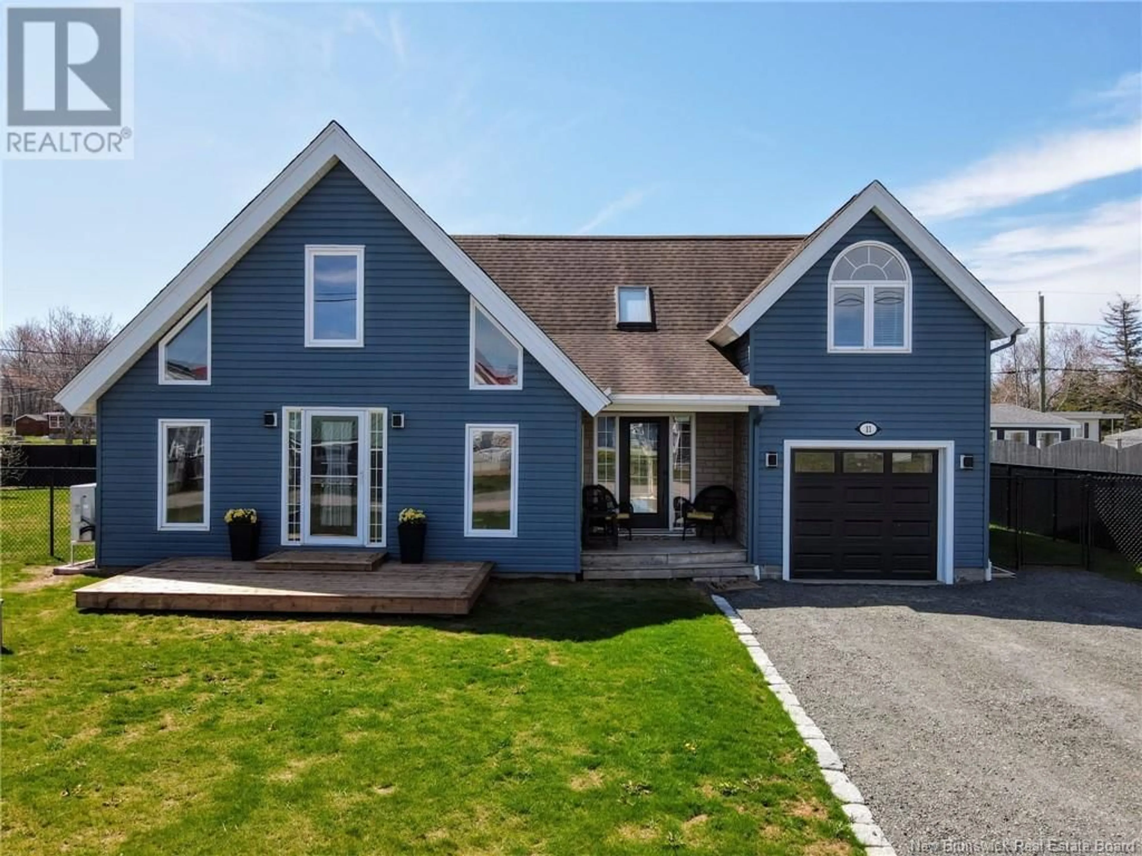 Home with vinyl exterior material, street for 11 BAYBREEZE LANE, Grand-Barachois New Brunswick E4P0Y7