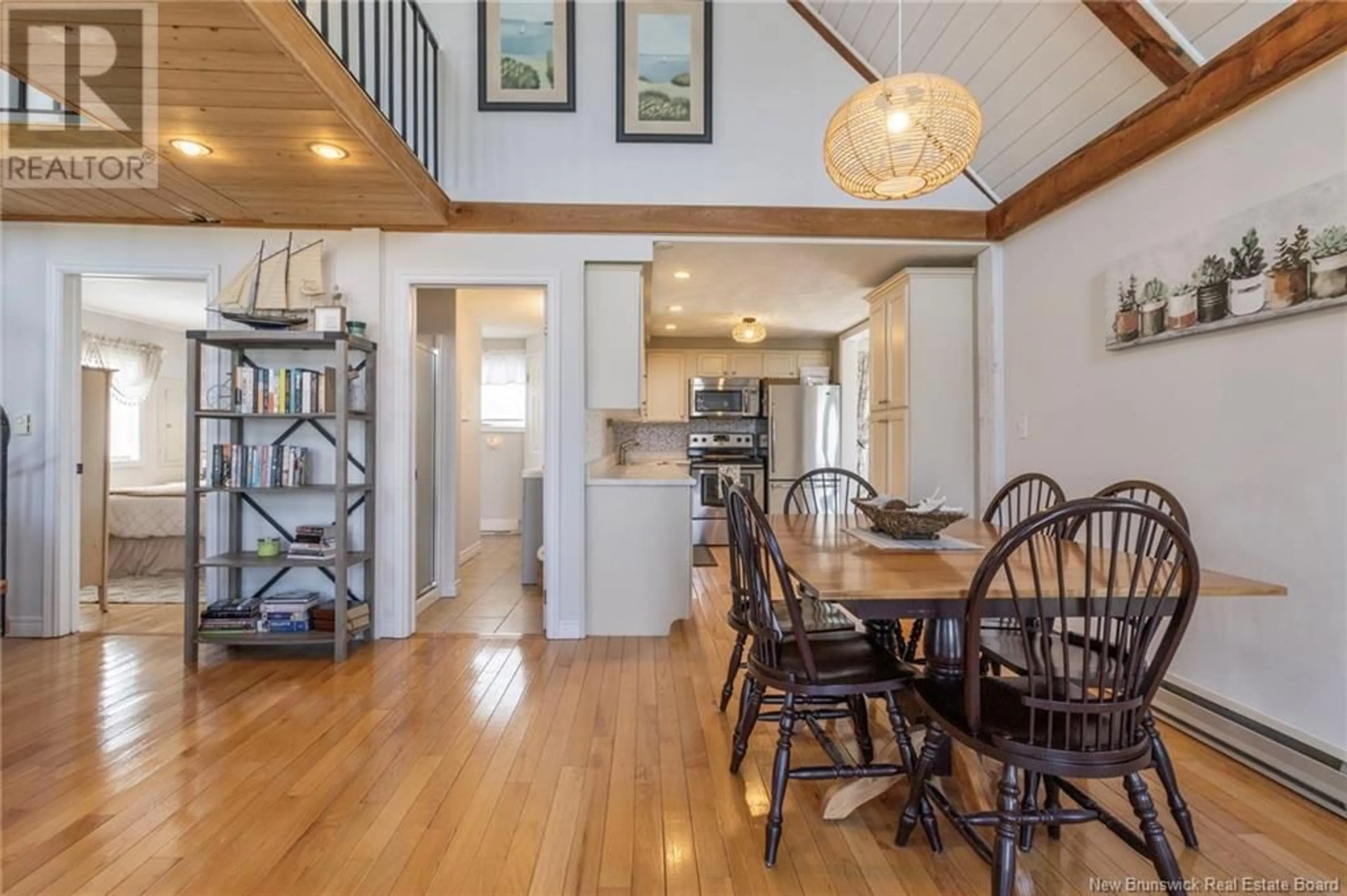 Dining room, wood/laminate floor for 11 BAYBREEZE LANE, Grand-Barachois New Brunswick E4P0Y7