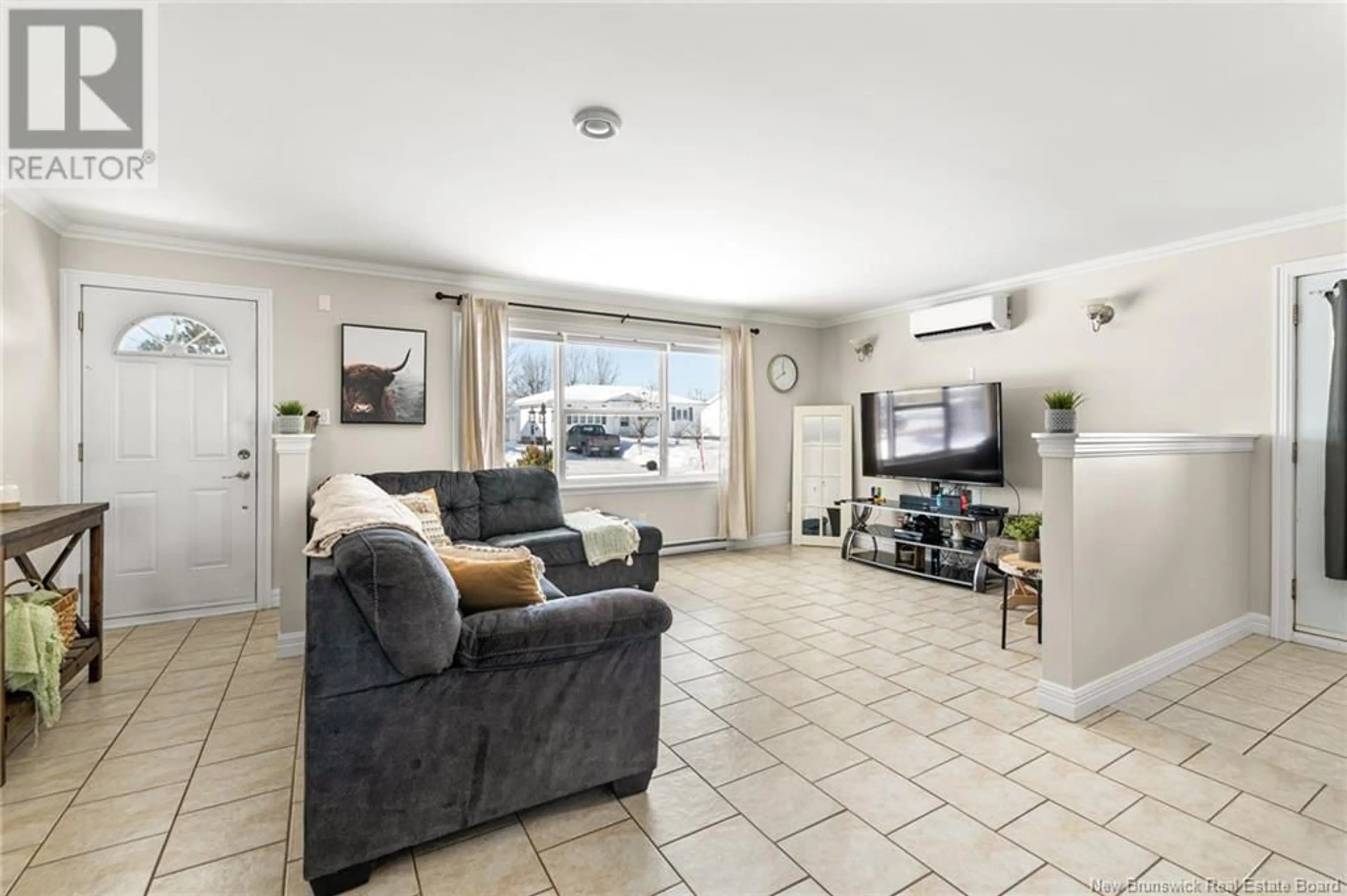 Living room with furniture, ceramic/tile floor for 29 Saunders Street, Riverview New Brunswick E1B4N8