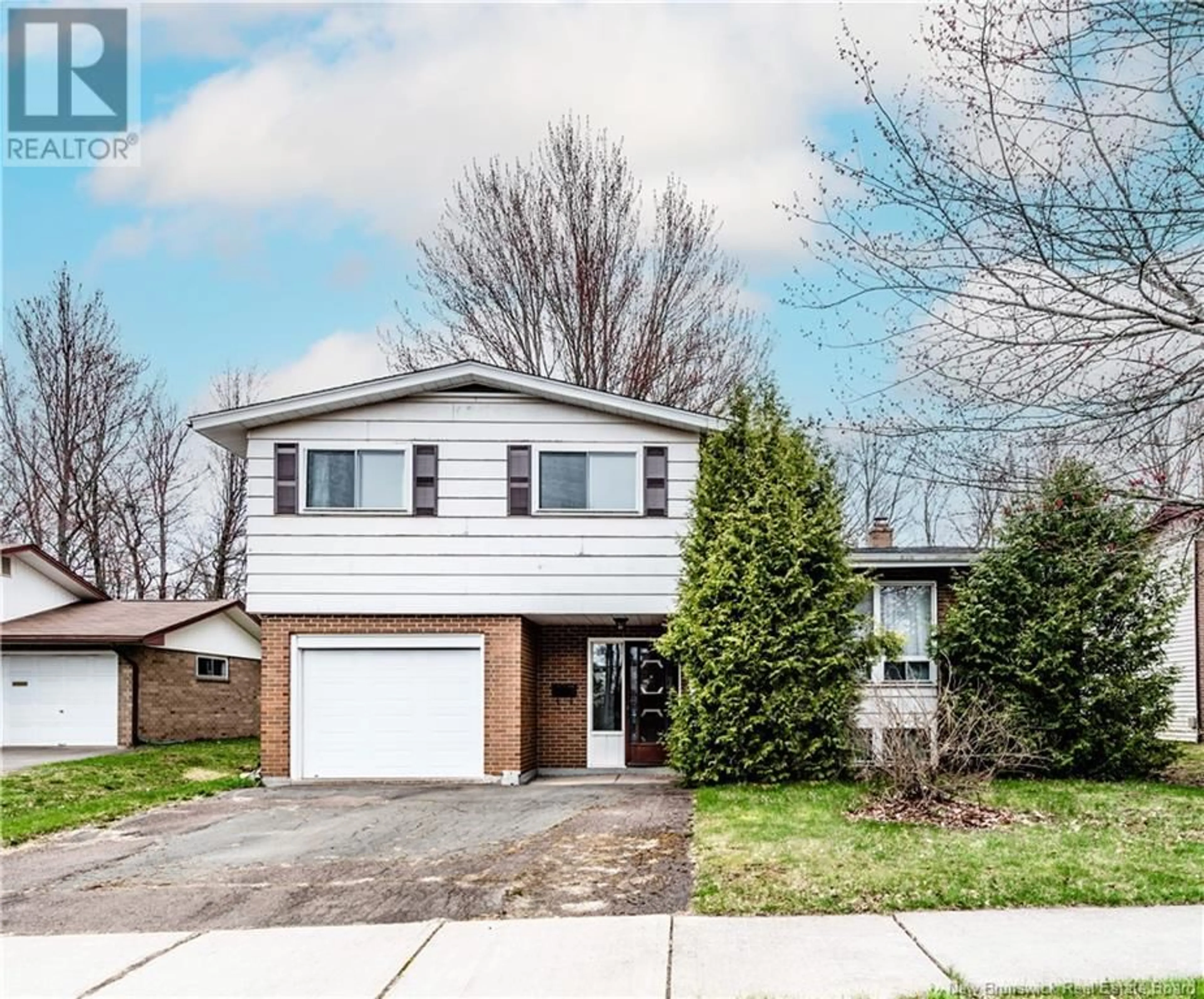 Home with vinyl exterior material, street for 69 CHANDLER CRESCENT, Moncton New Brunswick E1C3W6