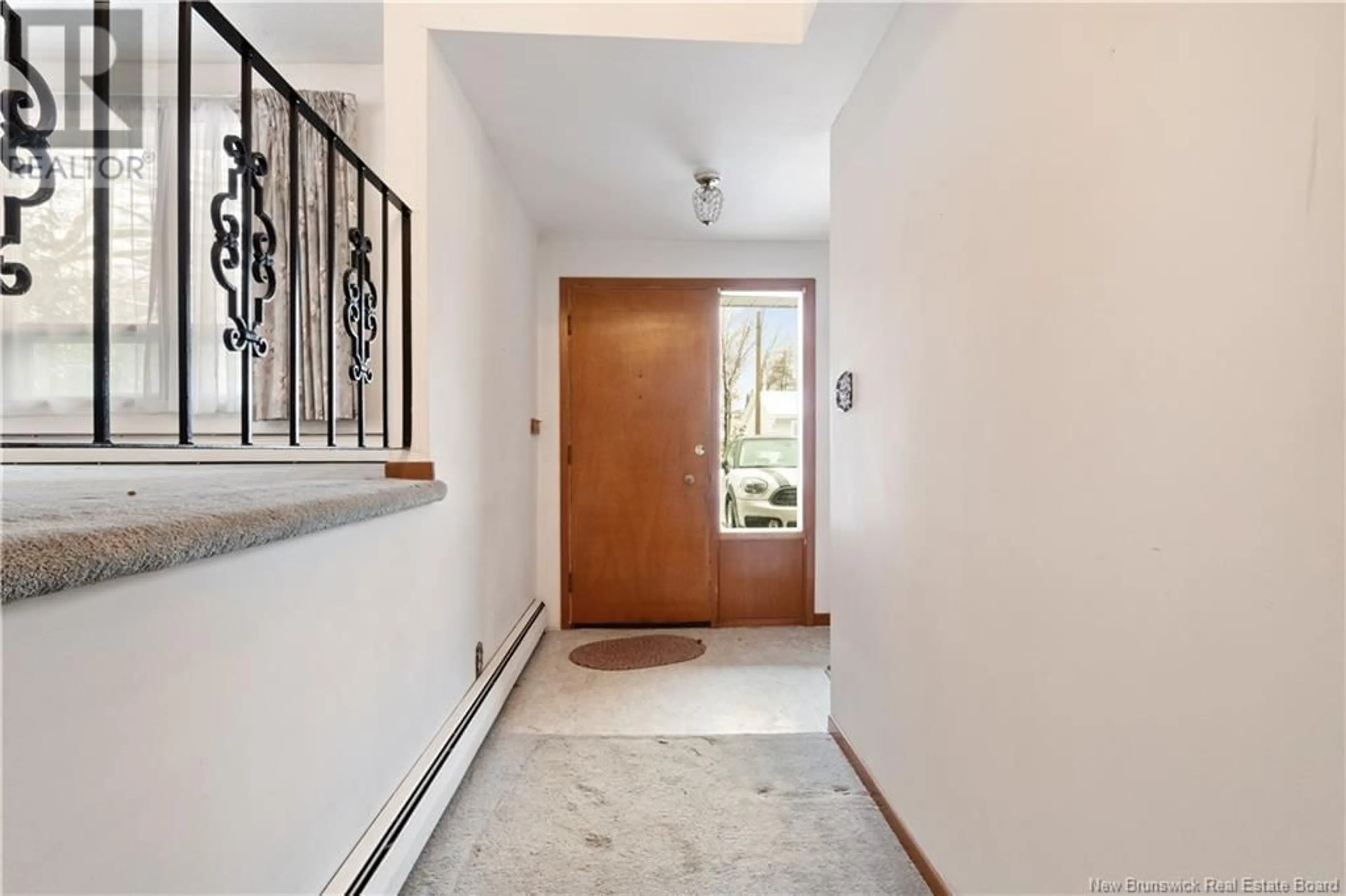 Indoor foyer for 69 CHANDLER CRESCENT, Moncton New Brunswick E1C3W6