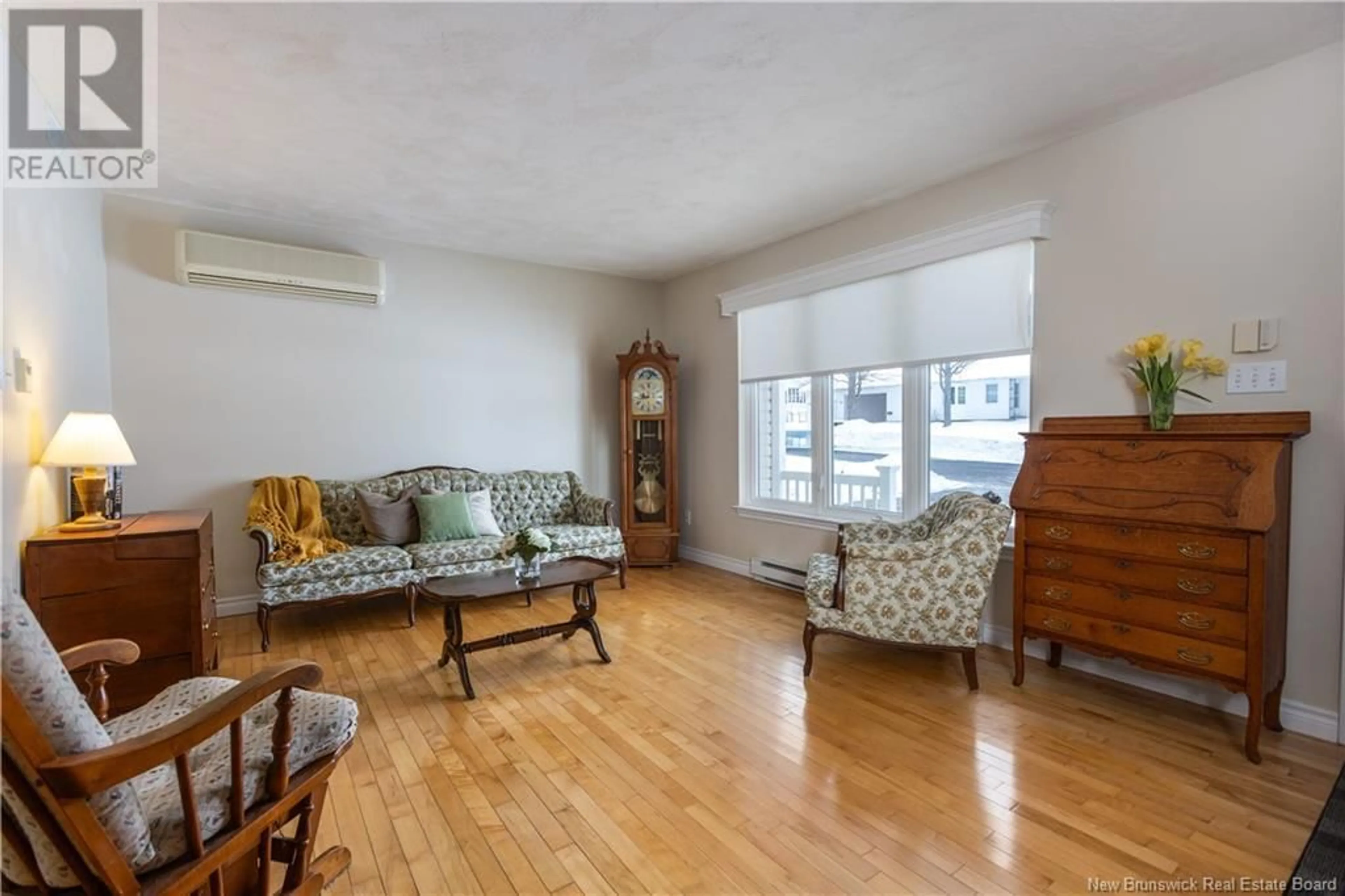 Living room with furniture, wood/laminate floor for 39 Manning Road, Riverview New Brunswick E1B3X3