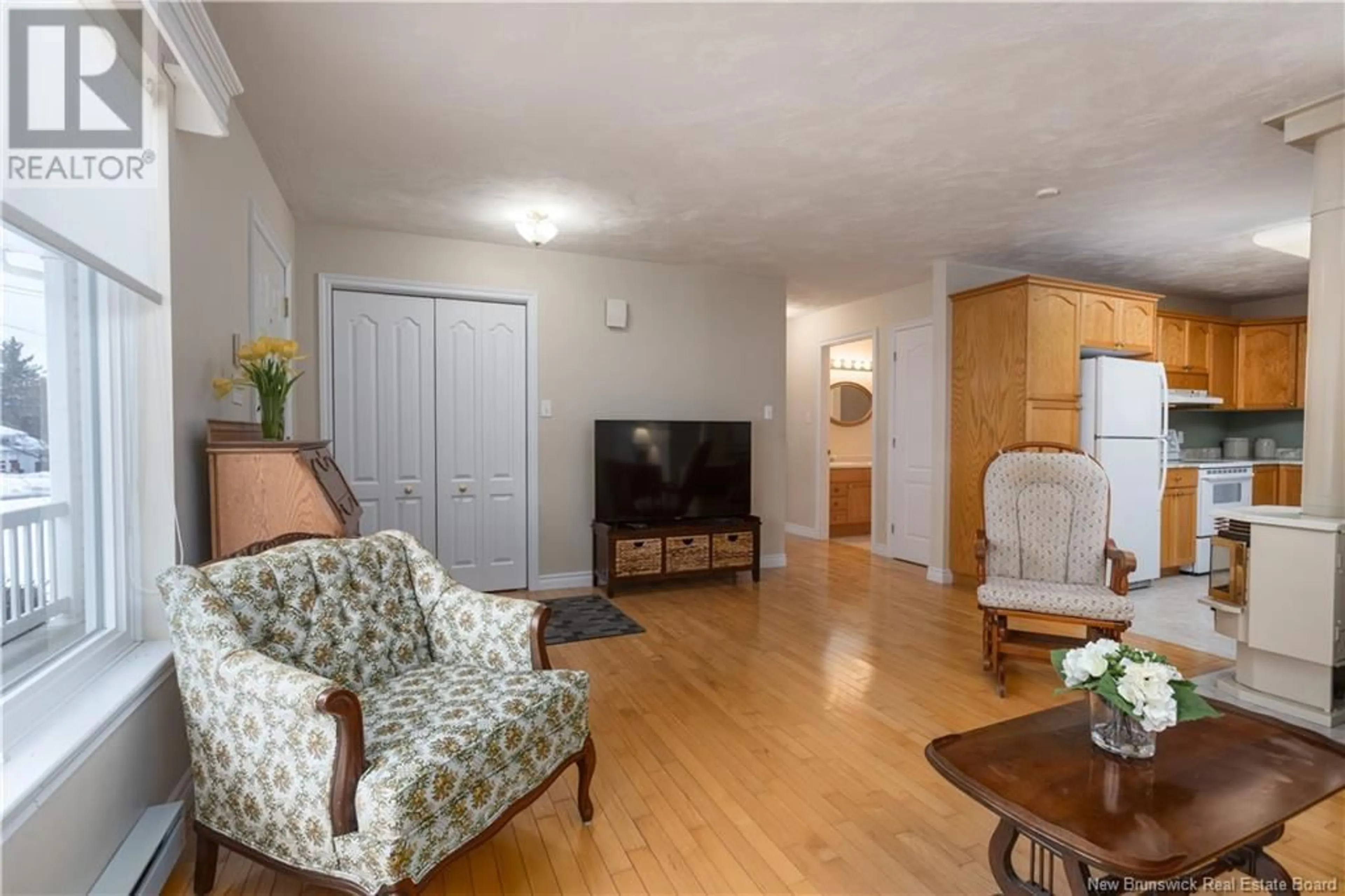 Living room with furniture, wood/laminate floor for 39 Manning Road, Riverview New Brunswick E1B3X3