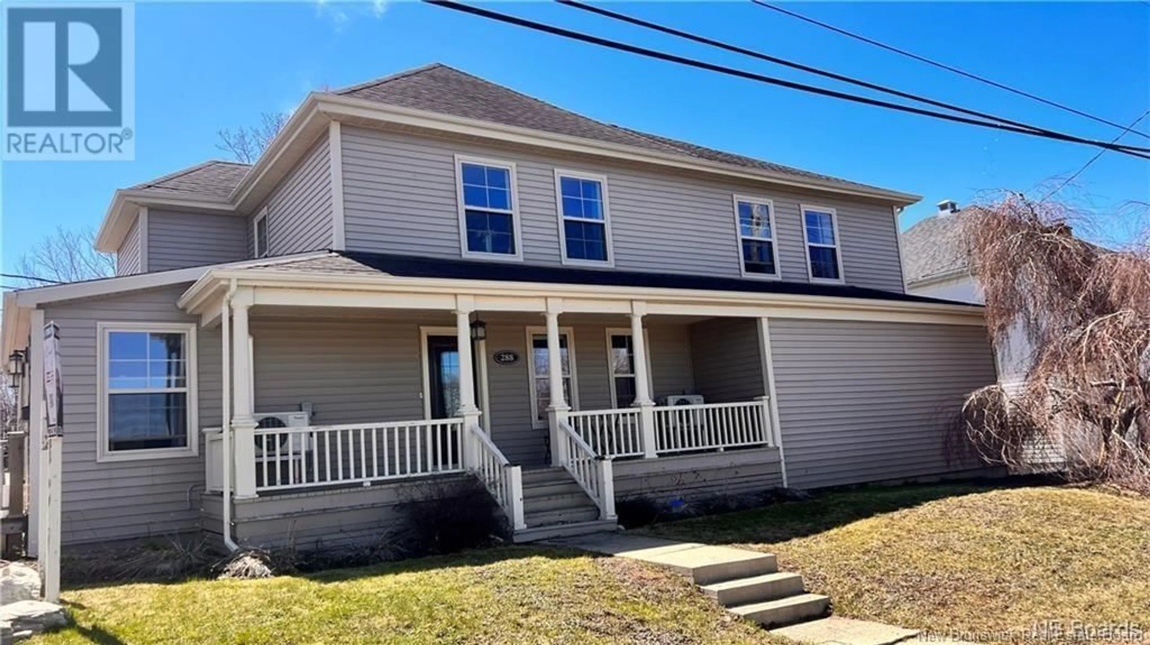 Home with vinyl exterior material, street for 288 St-John, Bathurst New Brunswick E2A1E7