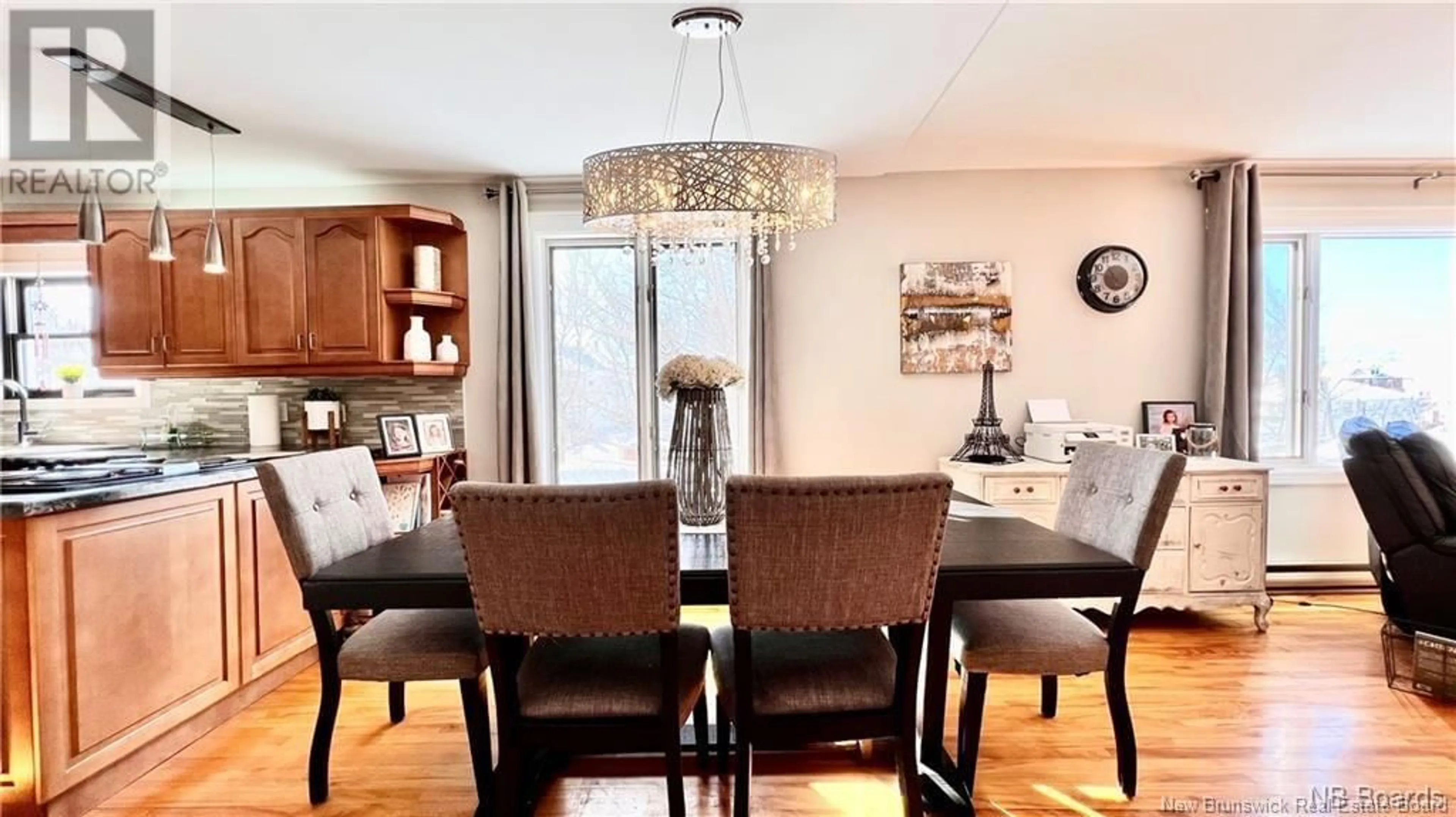 Dining room, wood/laminate floor for 288 St-John, Bathurst New Brunswick E2A1E7