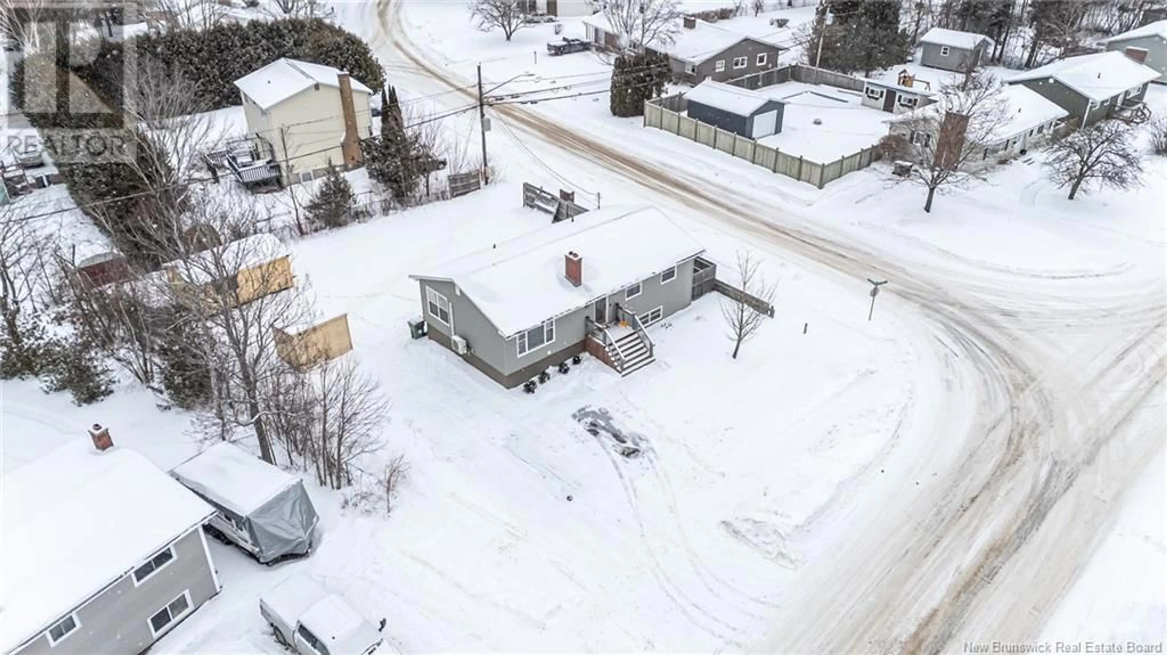 A pic from outside/outdoor area/front of a property/back of a property/a pic from drone, unknown for 102 Daniel Drive, New Maryland New Brunswick E3C1C8