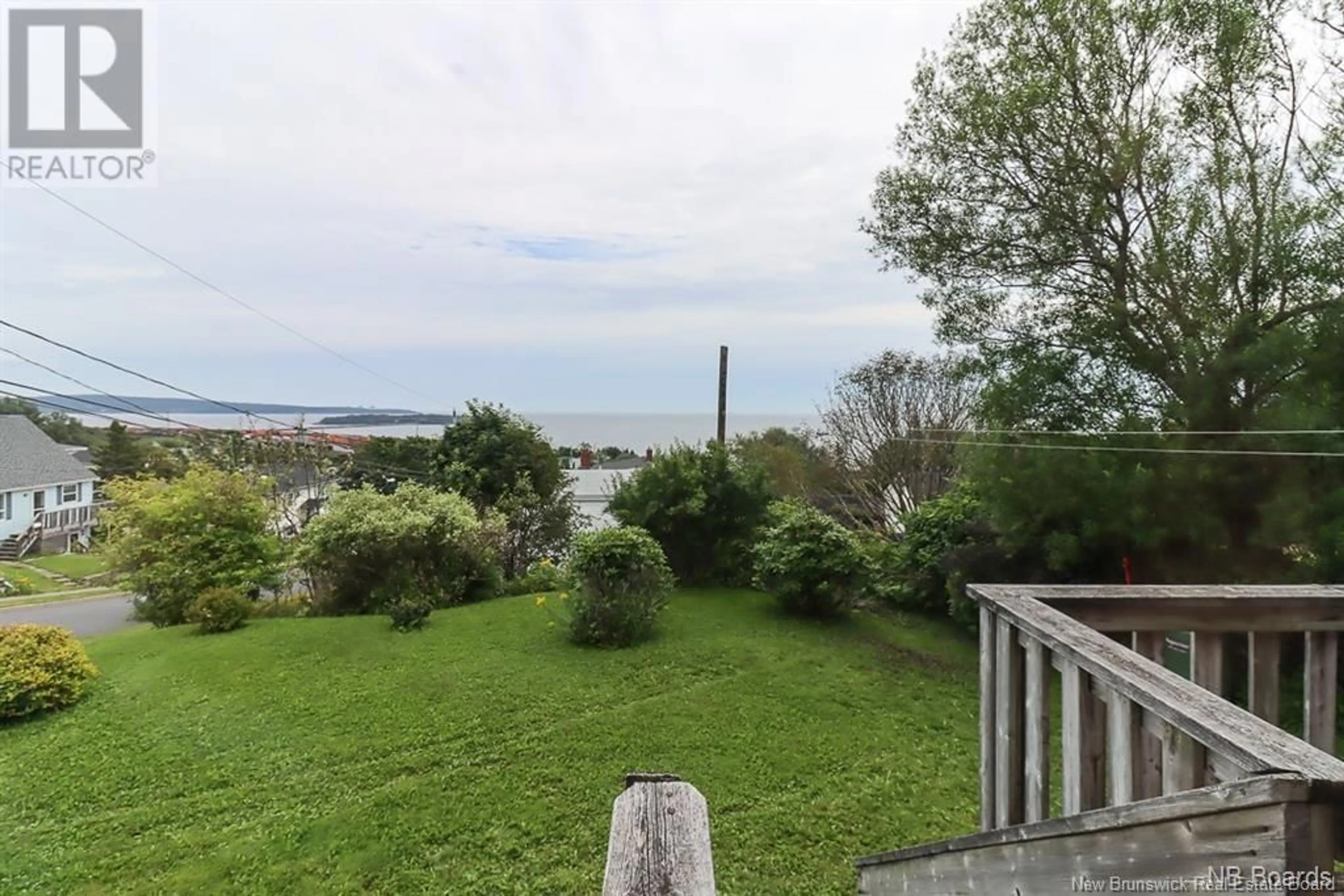 A pic from outside/outdoor area/front of a property/back of a property/a pic from drone, water/lake/river/ocean view for 632 Centre Street, Saint John New Brunswick E2M2P6