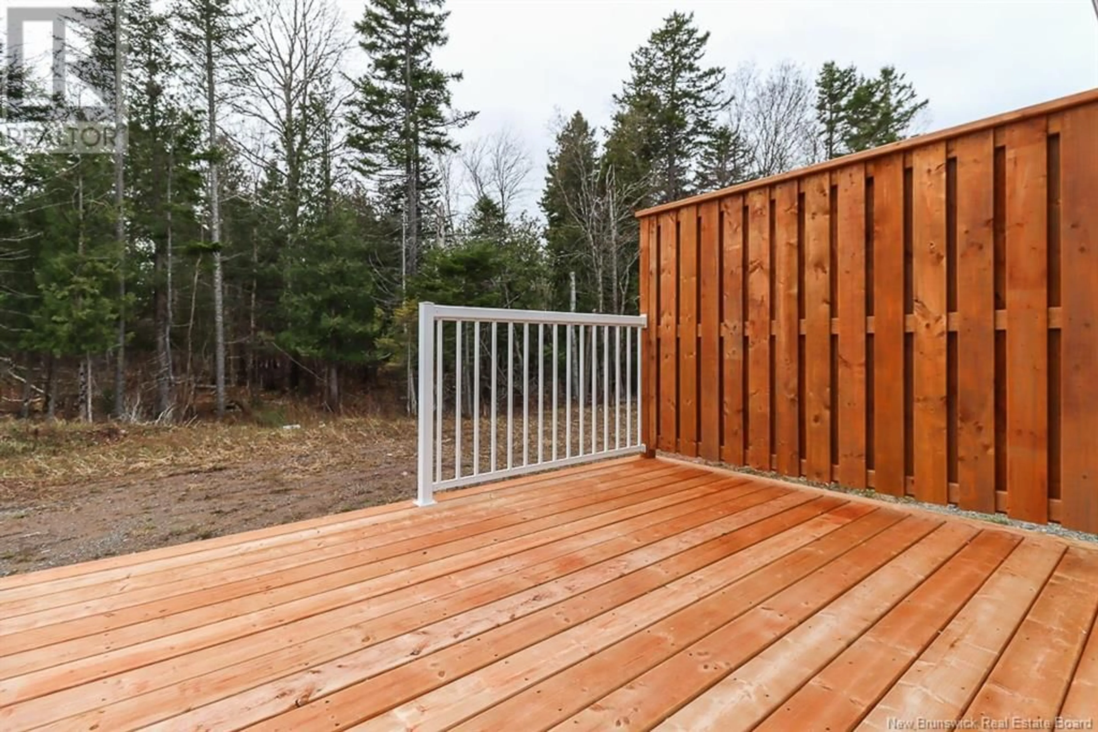 Patio, forest/trees view for 22 Elmwood Drive, Hampton New Brunswick E5N0P9