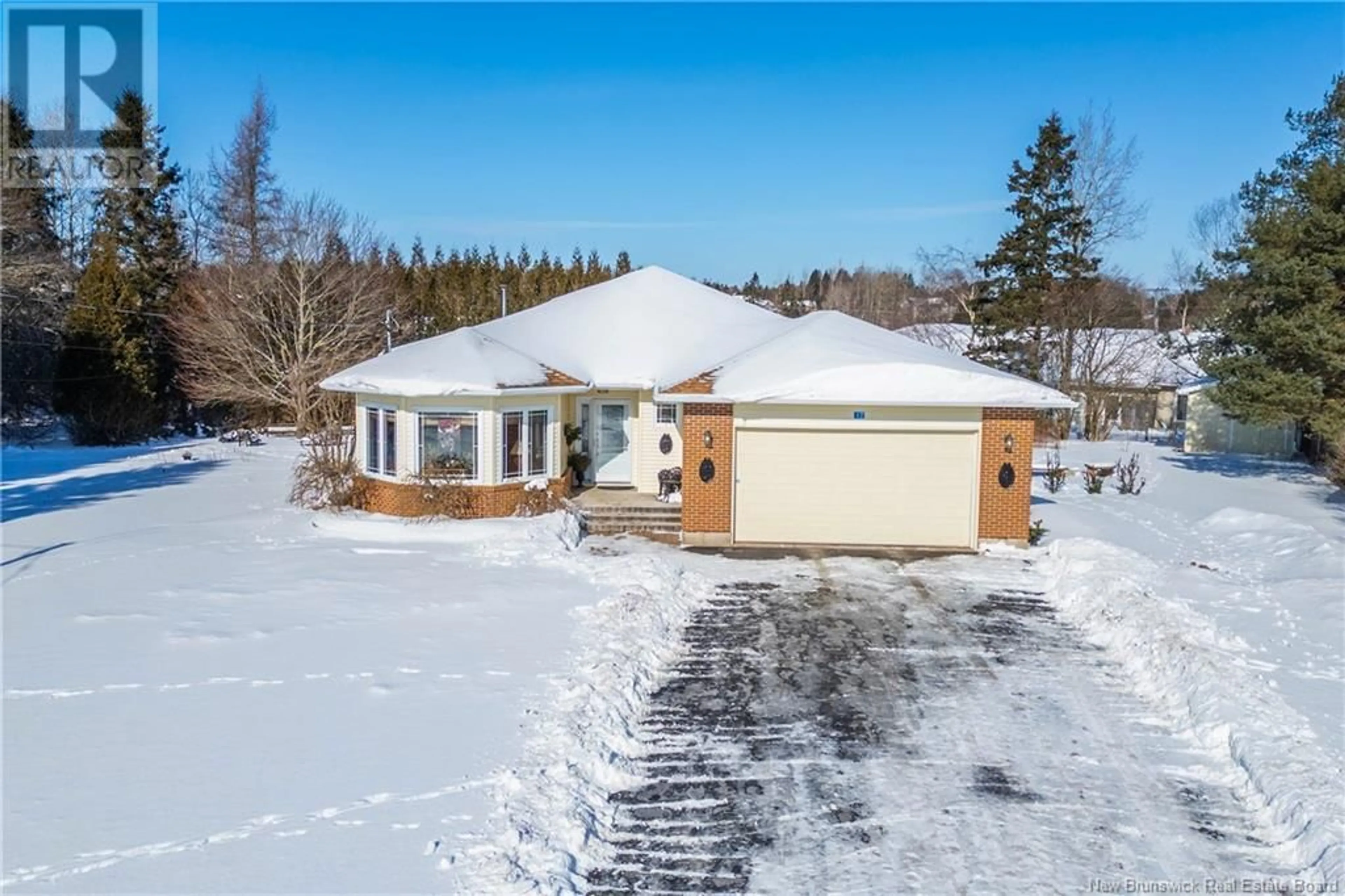 A pic from outside/outdoor area/front of a property/back of a property/a pic from drone, street for 17 Bowes Avenue, Sackville New Brunswick E4L3M9