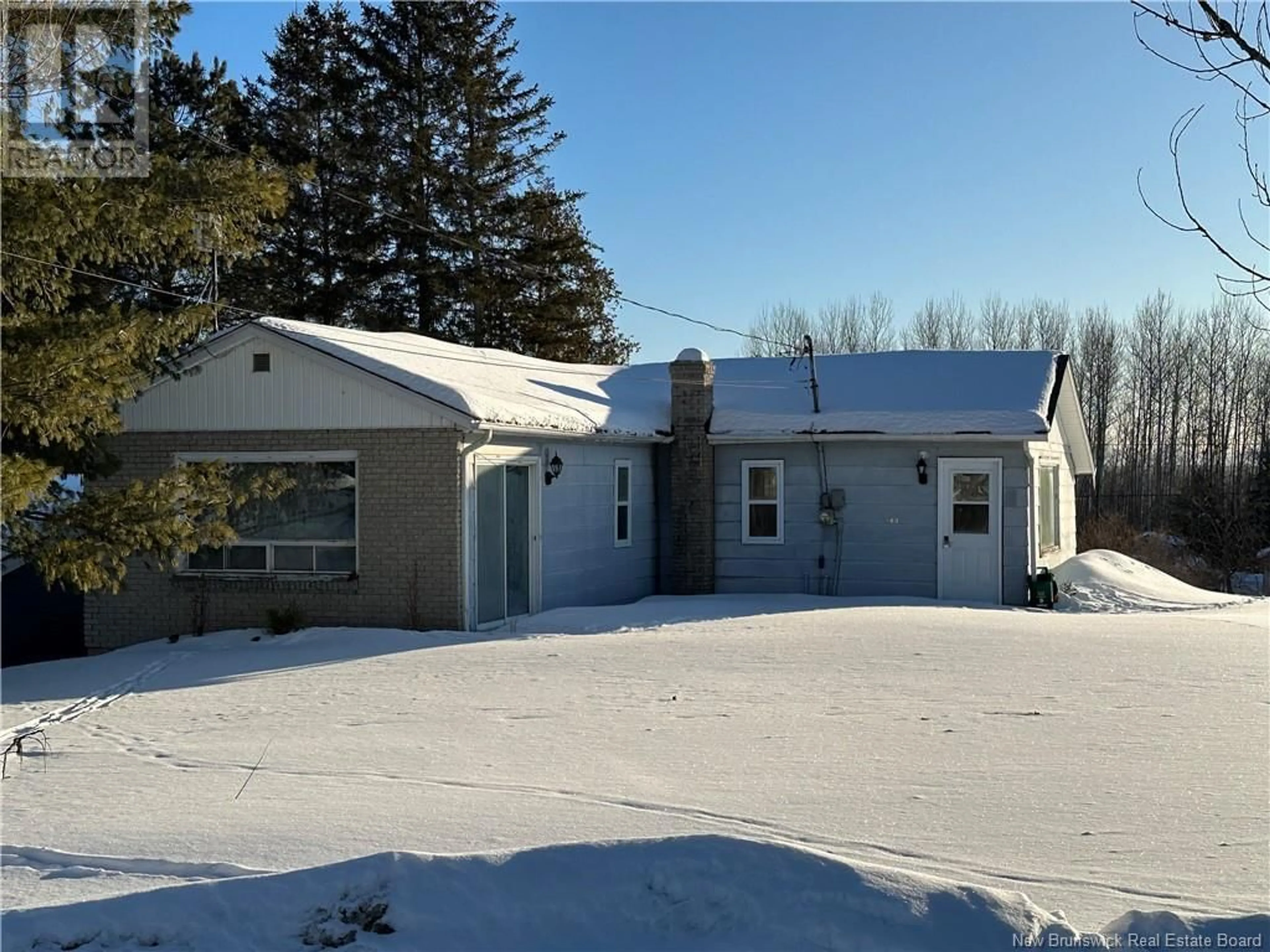 A pic from outside/outdoor area/front of a property/back of a property/a pic from drone, street for 140 MAIN STREET, Plaster Rock New Brunswick E7G2E4