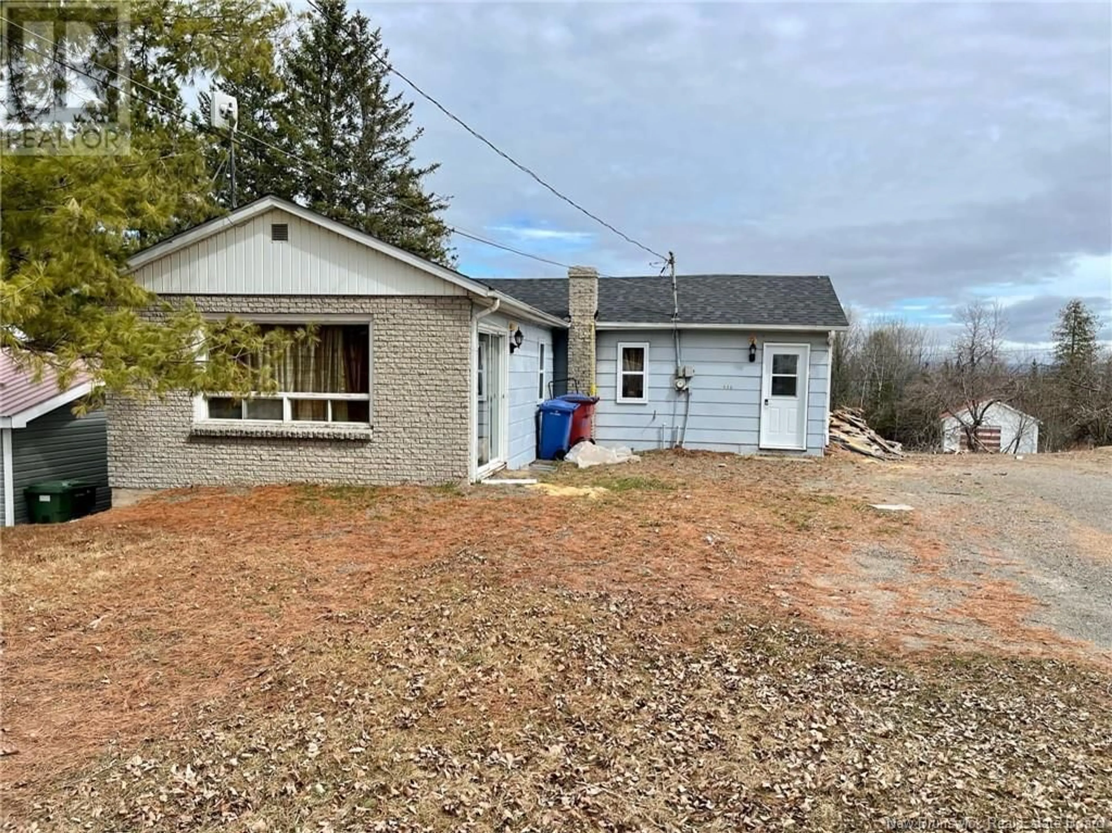 A pic from outside/outdoor area/front of a property/back of a property/a pic from drone, street for 140 Main Street, Plaster Rock New Brunswick E7G2E4