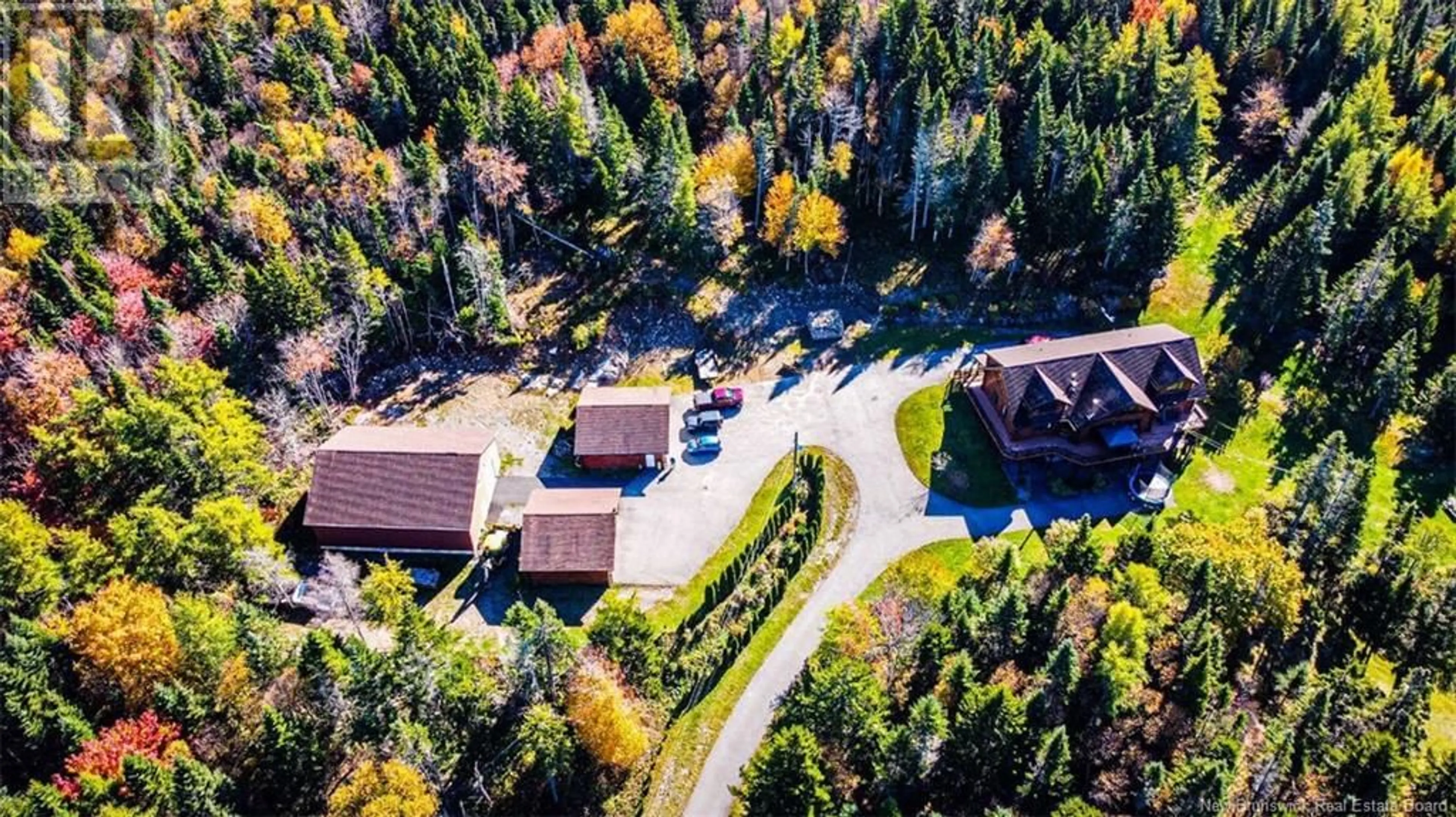 A pic from outside/outdoor area/front of a property/back of a property/a pic from drone, forest/trees view for 44 Taylor Lake Road, Willow Grove New Brunswick E2S1P5