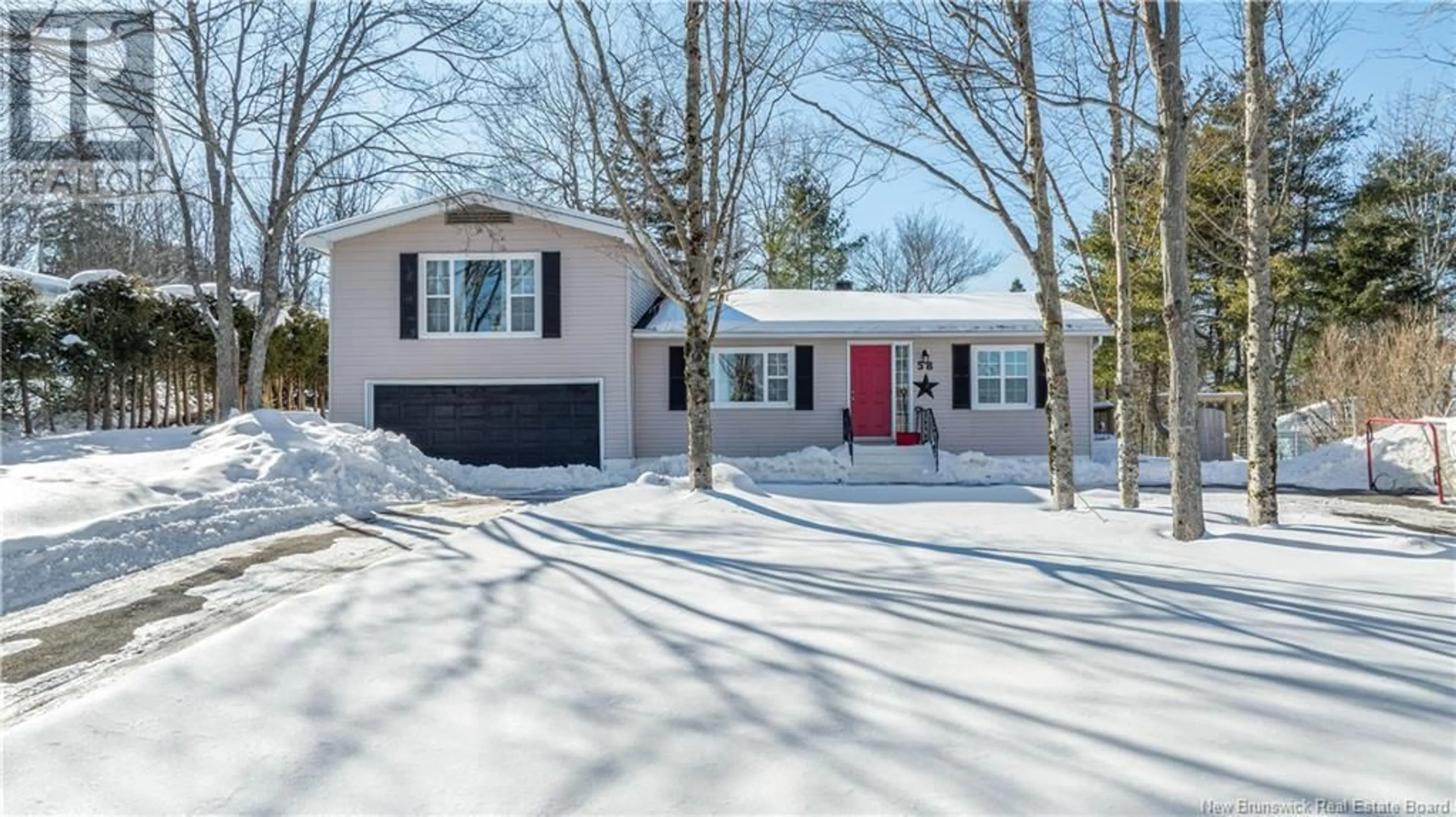 Home with vinyl exterior material, street for 58 Iona Avenue, Rothesay New Brunswick E2E3J6