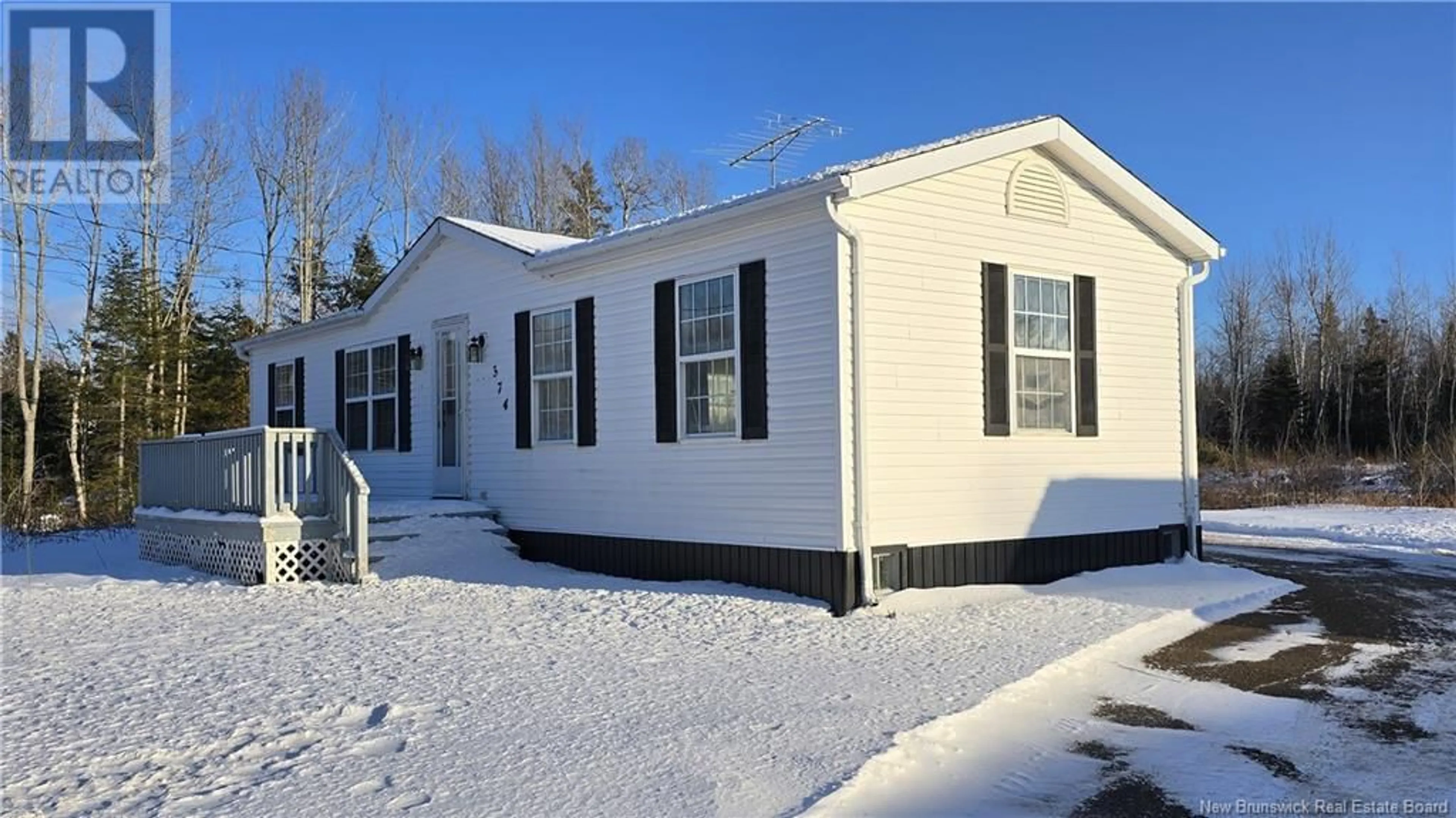 Home with vinyl exterior material, street for 374 Chemin Georges Street, Pont-Landry New Brunswick E1X2T7