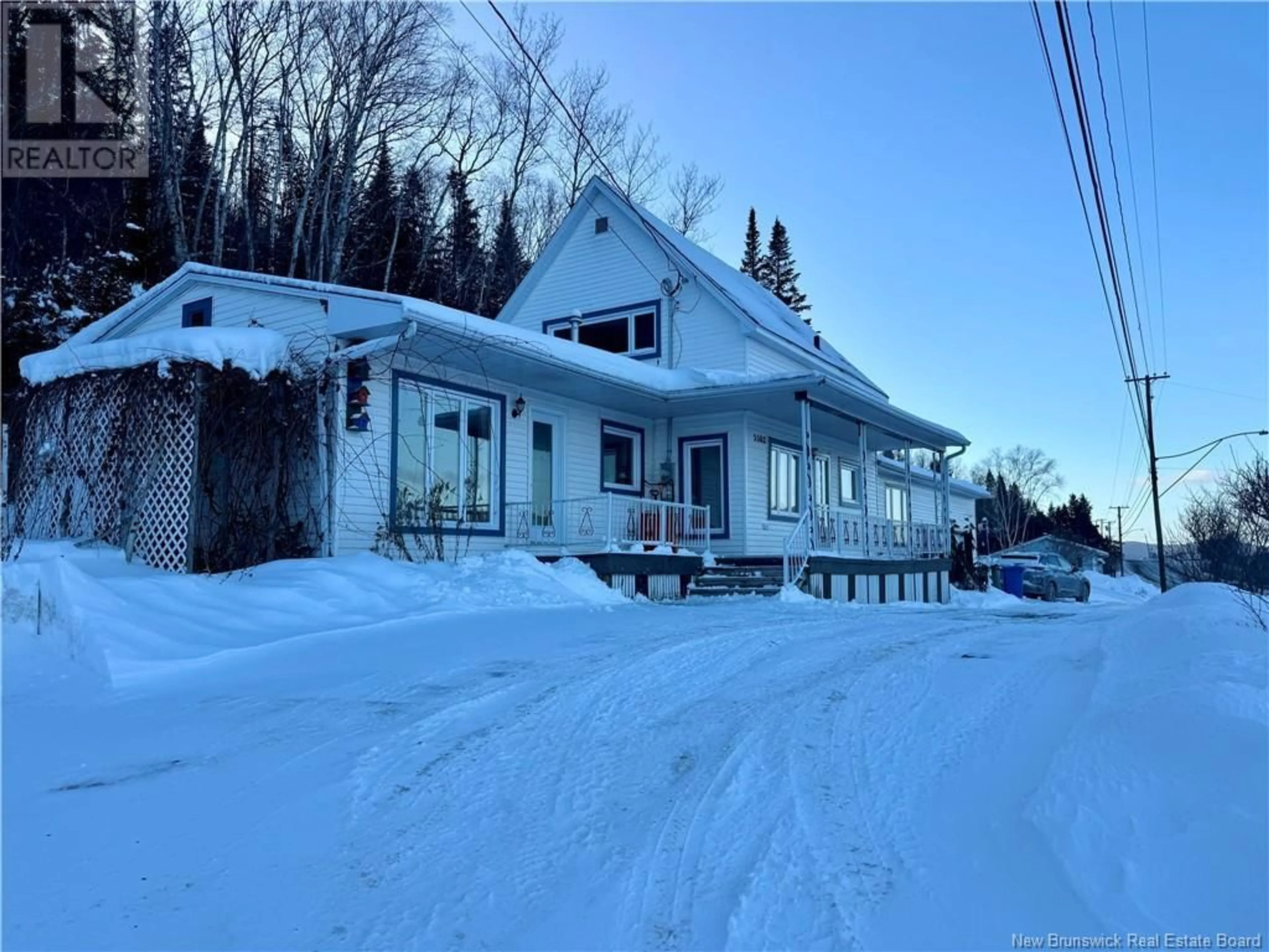 A pic from outside/outdoor area/front of a property/back of a property/a pic from drone, street for 5502 Centrale Street, Lac Baker New Brunswick E7A1H7