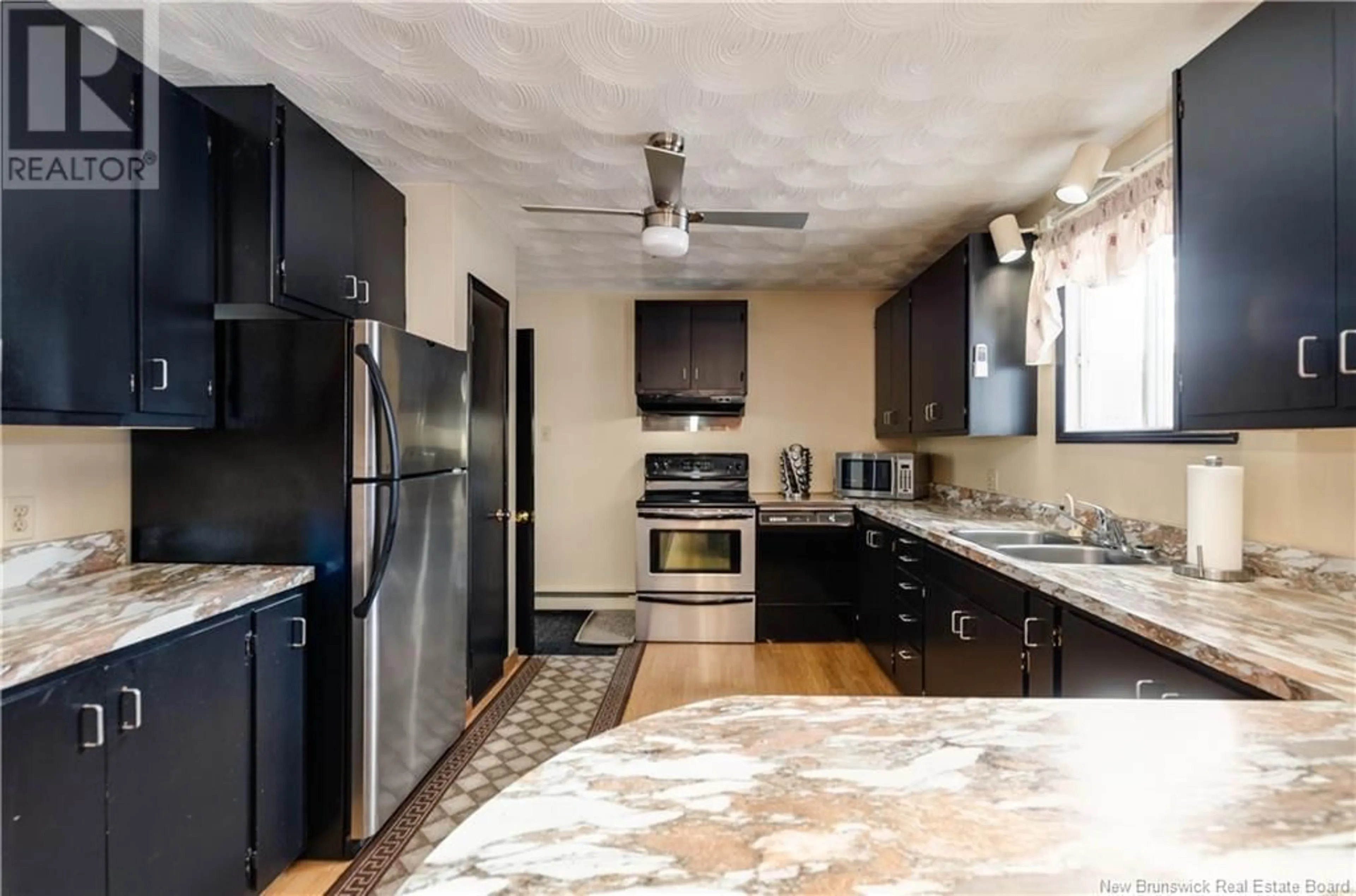 Open concept kitchen, ceramic/tile floor for 308 LOWER MOUNTAIN ROAD, Boundary Creek New Brunswick E1G4C5