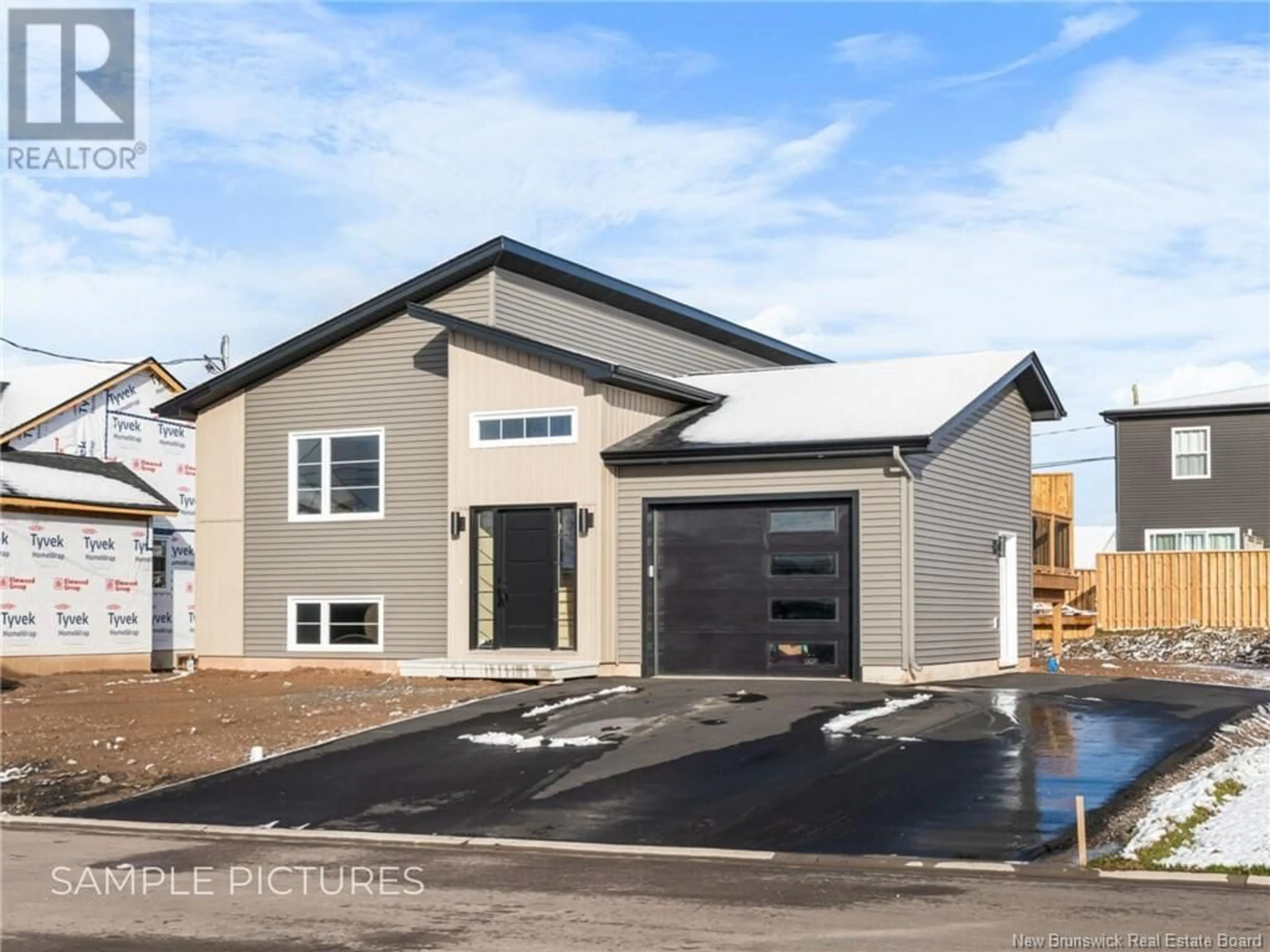 Home with vinyl exterior material, street for 449 GASPÉ STREET, Dieppe New Brunswick E1A6T6