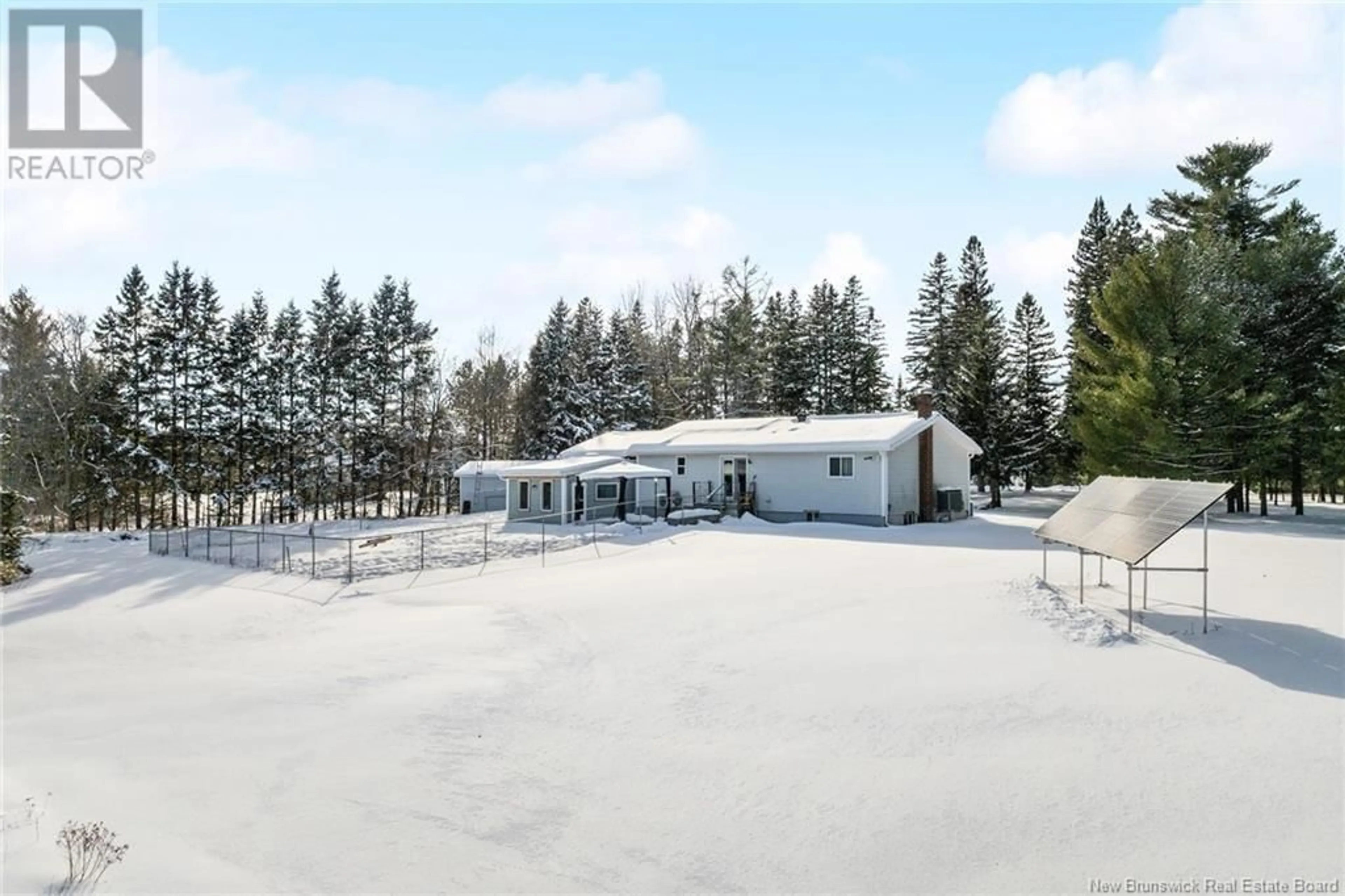 A pic from outside/outdoor area/front of a property/back of a property/a pic from drone, unknown for 711 Main Street, Chipman New Brunswick E4A2R6