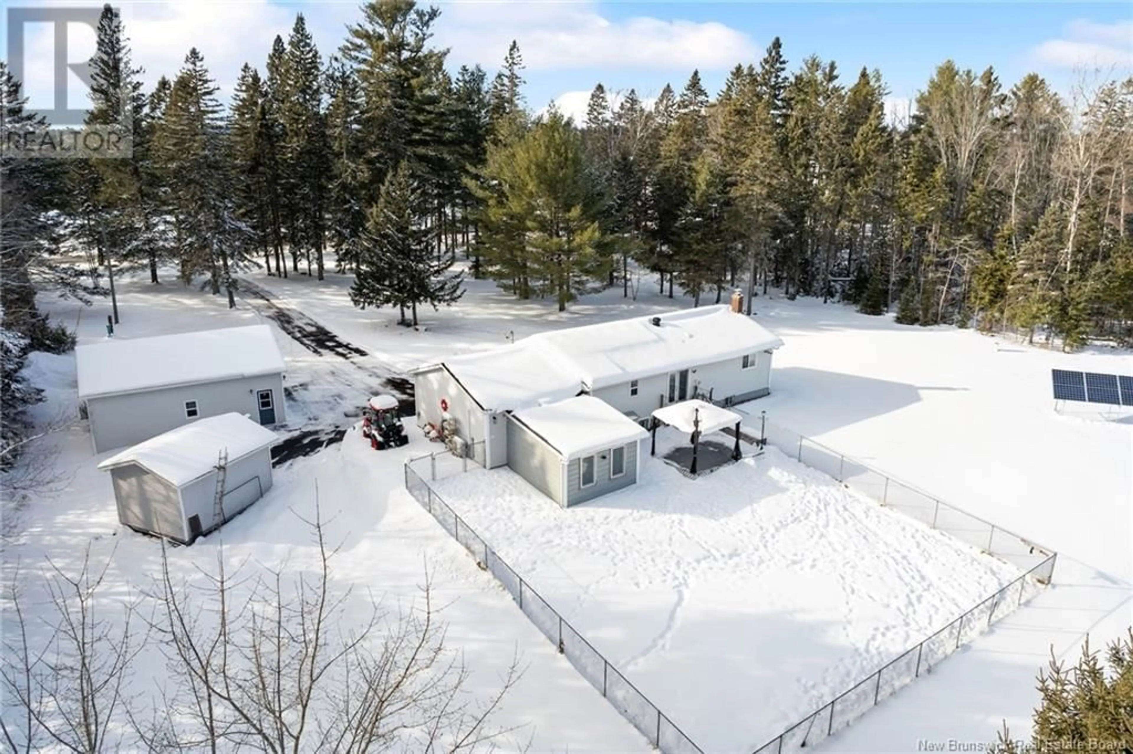 A pic from outside/outdoor area/front of a property/back of a property/a pic from drone, unknown for 711 Main Street, Chipman New Brunswick E4A2R6