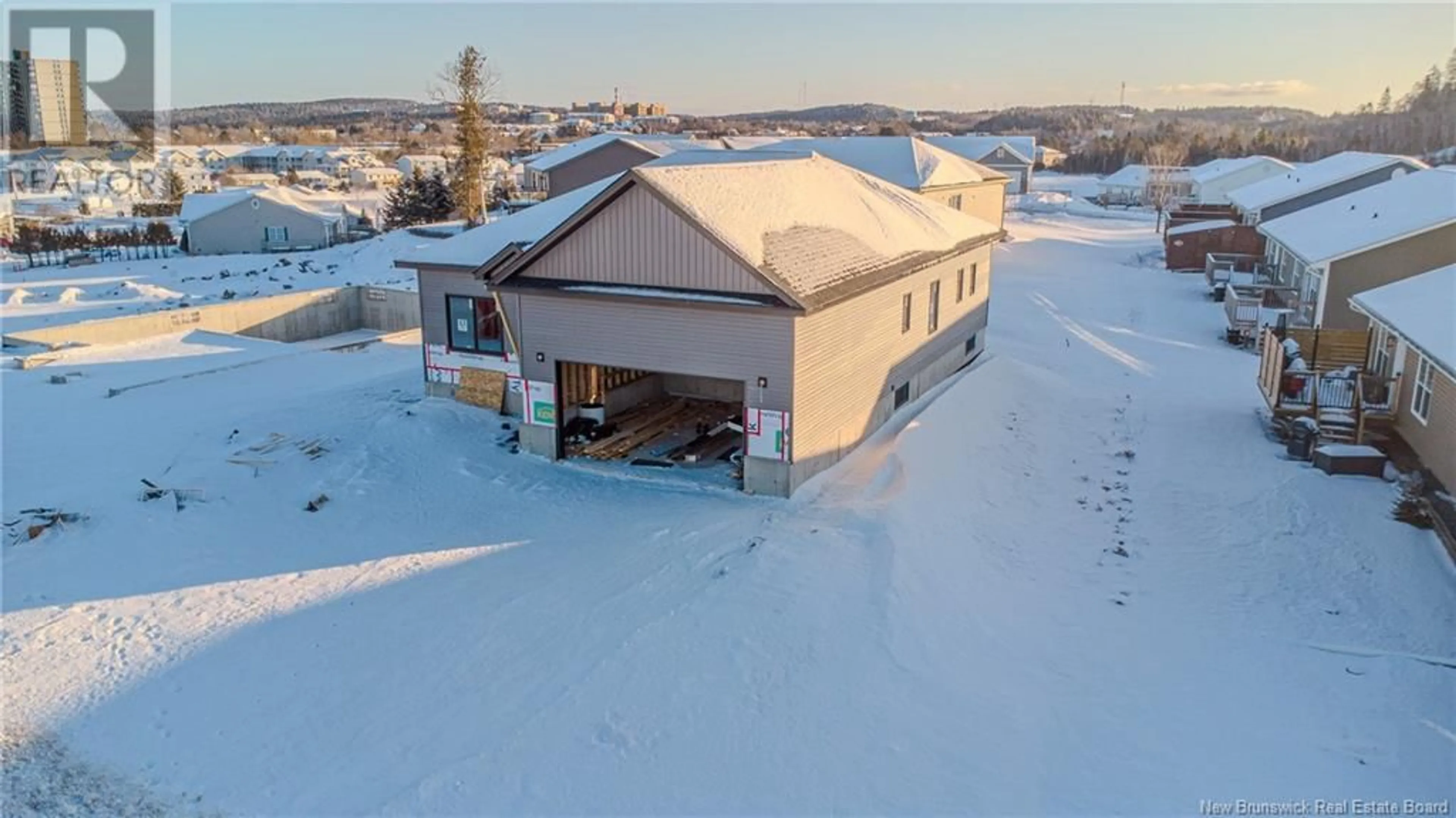 A pic from outside/outdoor area/front of a property/back of a property/a pic from drone, building for 75 Cambridge Drive, Saint John New Brunswick E2K5T3