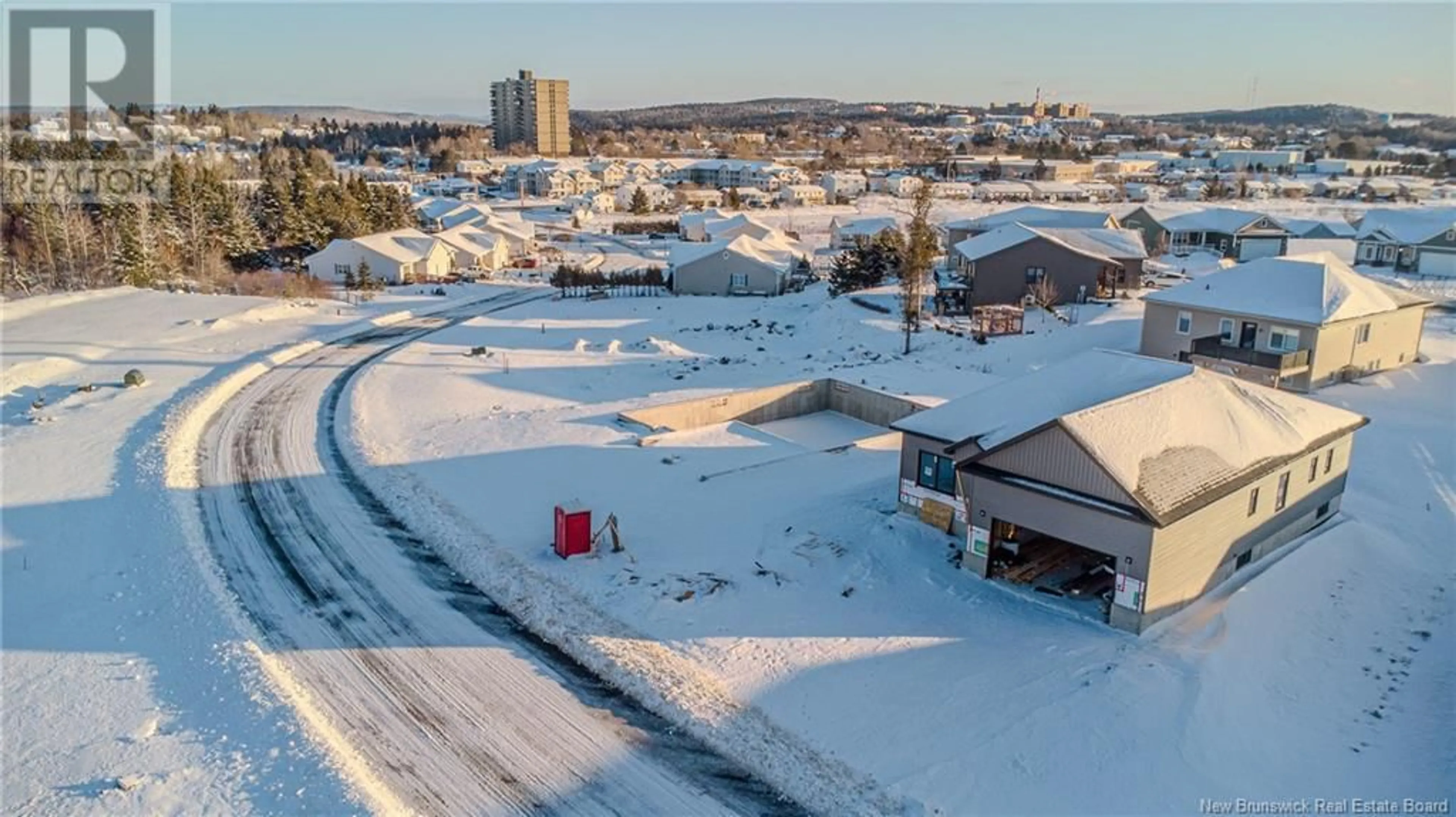 A pic from outside/outdoor area/front of a property/back of a property/a pic from drone, street for 75 Cambridge Drive, Saint John New Brunswick E2K5T3