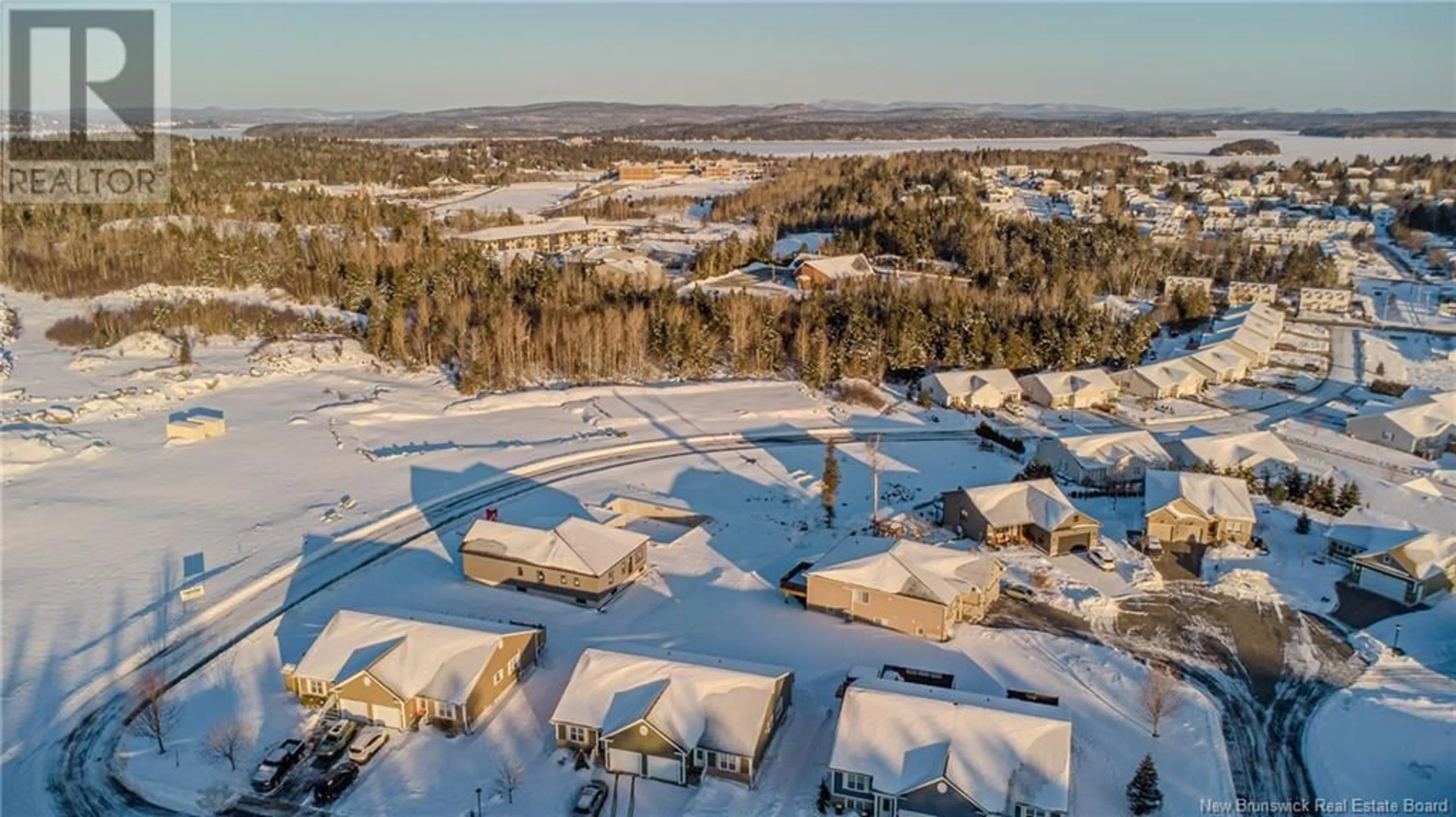 A pic from outside/outdoor area/front of a property/back of a property/a pic from drone, mountain view for 75 Cambridge Drive, Saint John New Brunswick E2K5T3