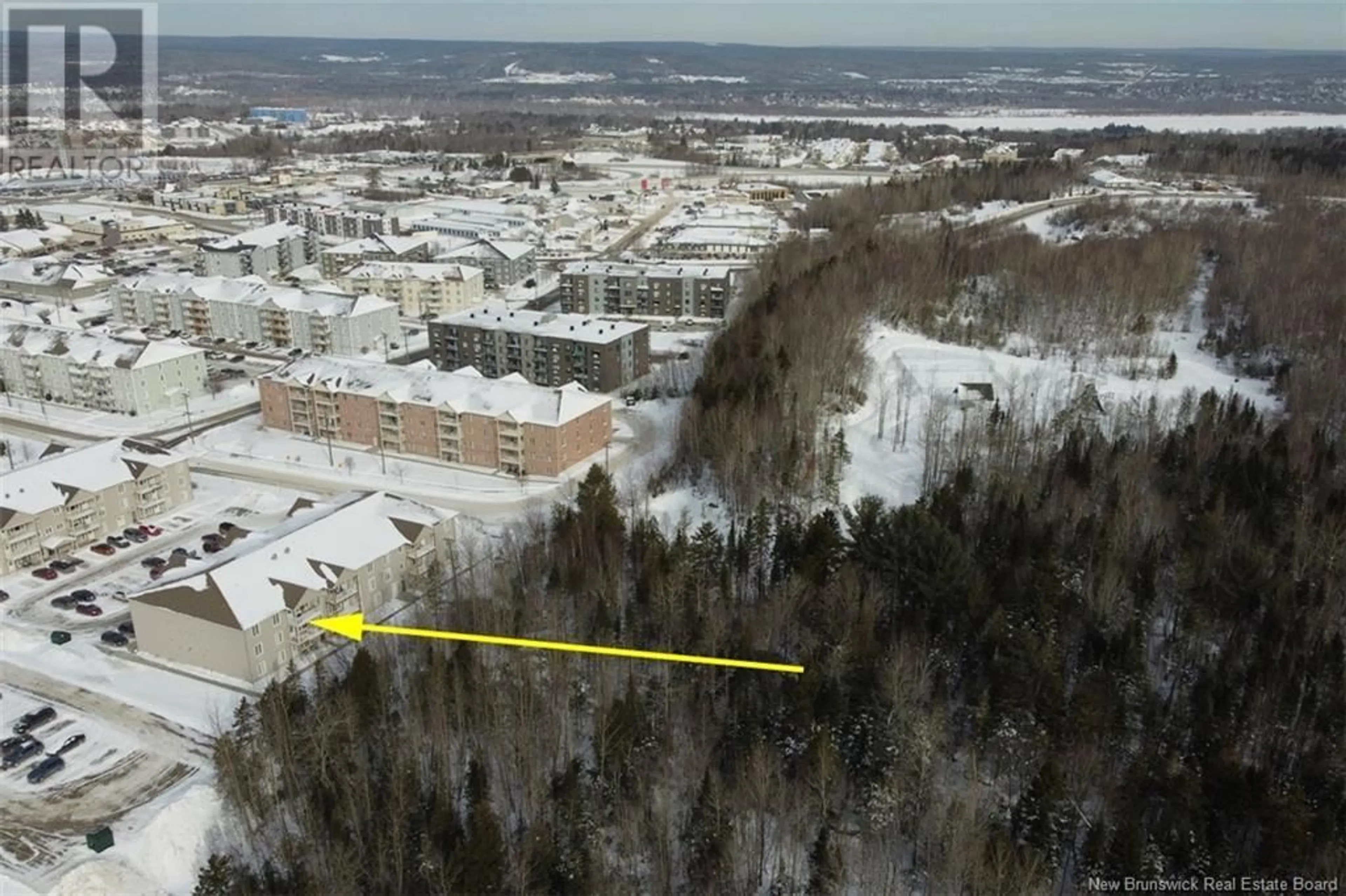 A pic from outside/outdoor area/front of a property/back of a property/a pic from drone, unknown for 170 Valcour Drive Unit# 210, Fredericton New Brunswick E3C0C9