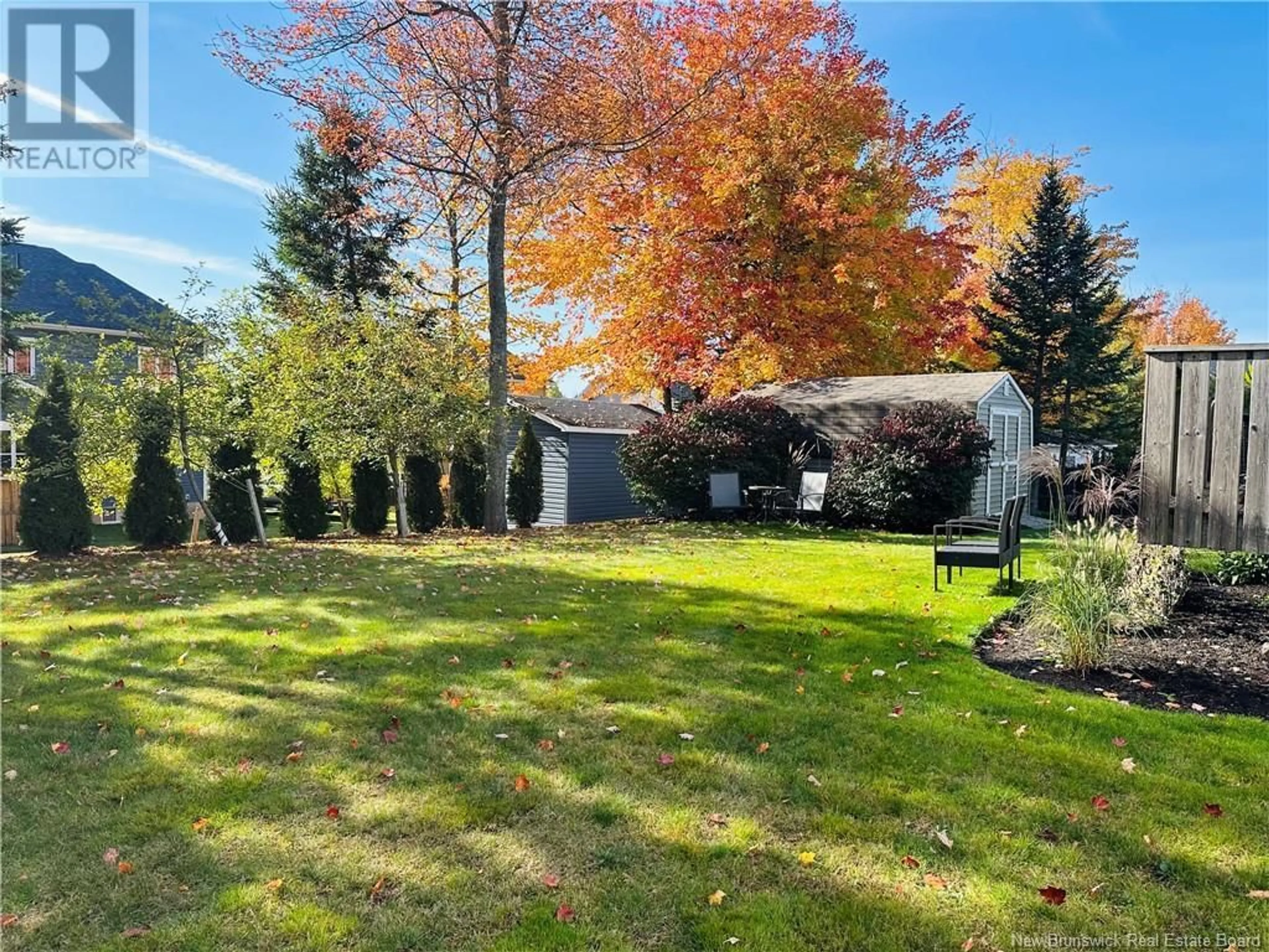 A pic from outside/outdoor area/front of a property/back of a property/a pic from drone, forest/trees view for 428 Gaspe Street, Dieppe New Brunswick E1A6V8