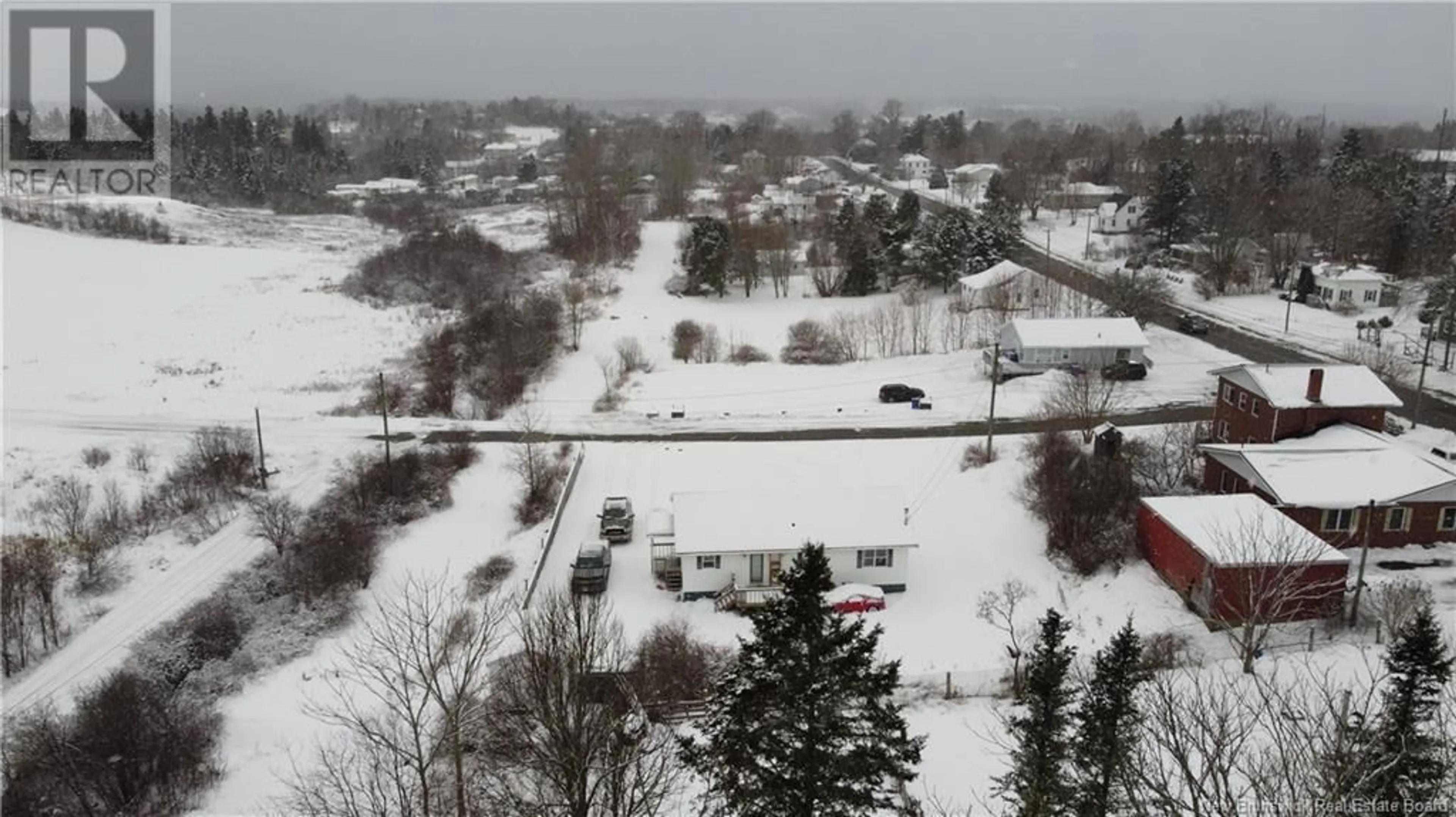 A pic from outside/outdoor area/front of a property/back of a property/a pic from drone, mountain view for 3 Hatt Crescent, St George New Brunswick E5C3G7