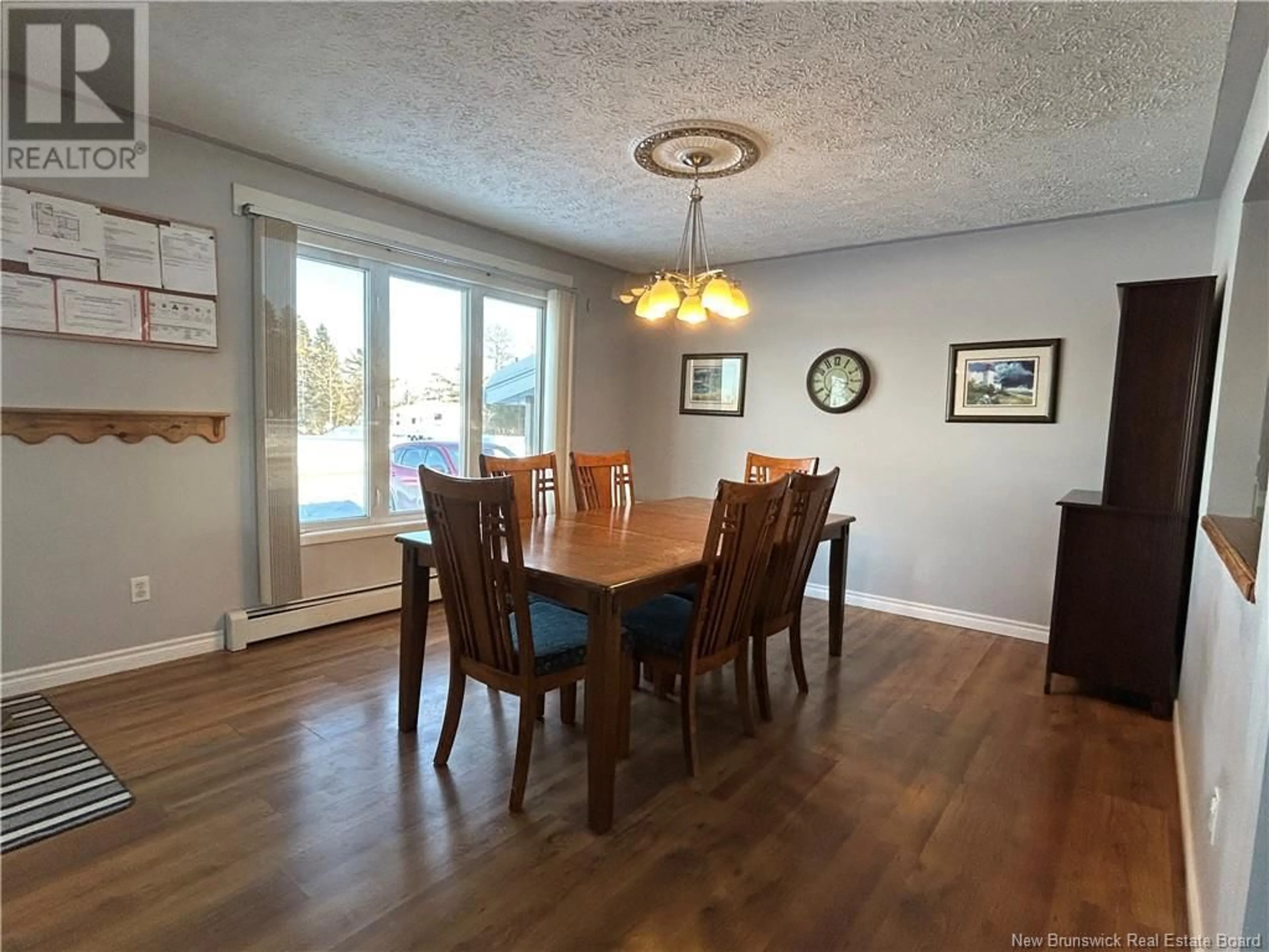 Dining room, wood/laminate floor for 53 Centennial Street, Plaster Rock New Brunswick E7G1J2