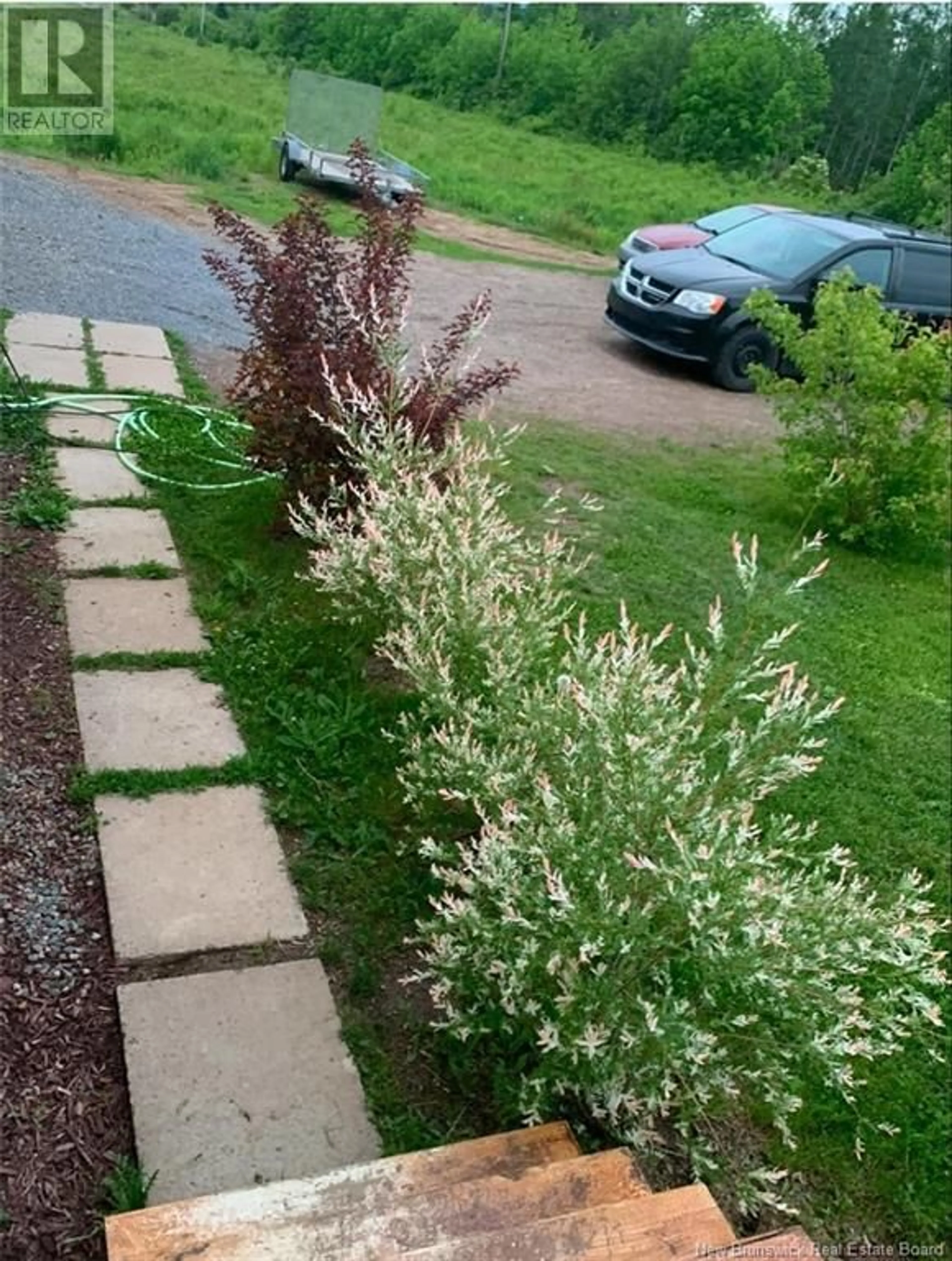 A pic from outside/outdoor area/front of a property/back of a property/a pic from drone, street for 282 Meadow Brook Road, Wirral New Brunswick E5L2T5