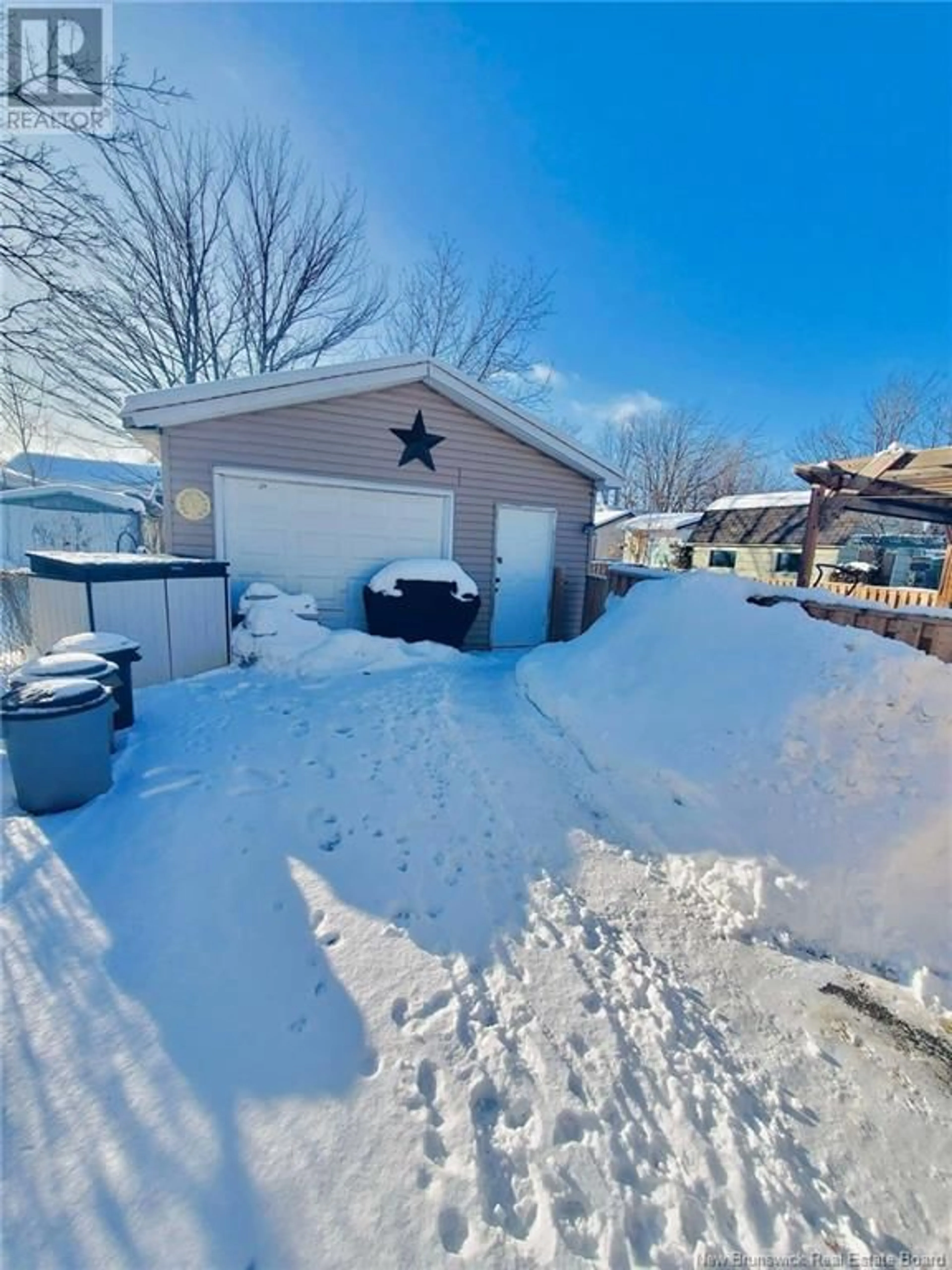 A pic from outside/outdoor area/front of a property/back of a property/a pic from drone, street for 202 snow Avenue, Moncton New Brunswick E1C8B5