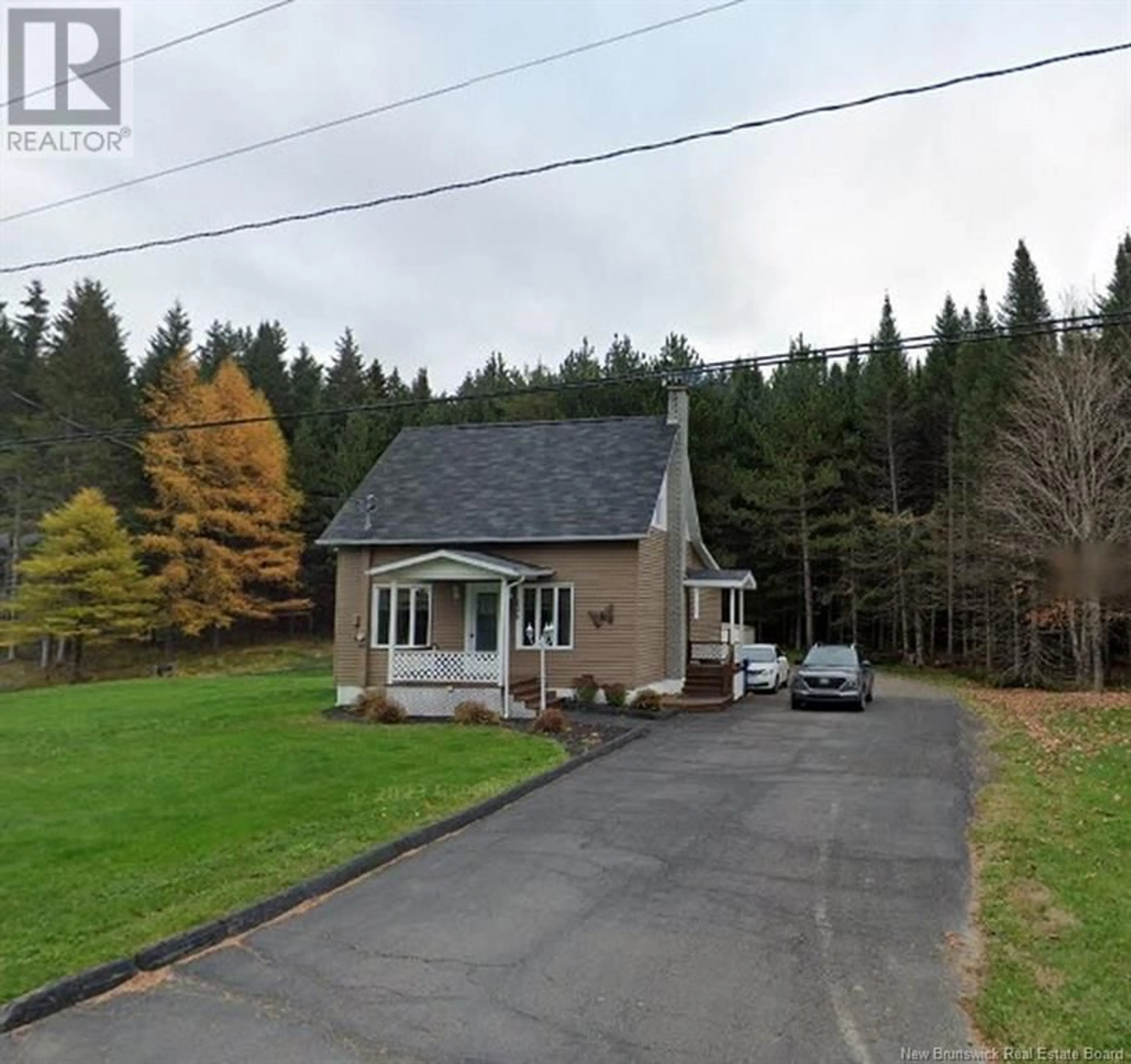 A pic from outside/outdoor area/front of a property/back of a property/a pic from drone, street for 125 Riviere-Verte Road, Rivière-Verte New Brunswick E7C3A1