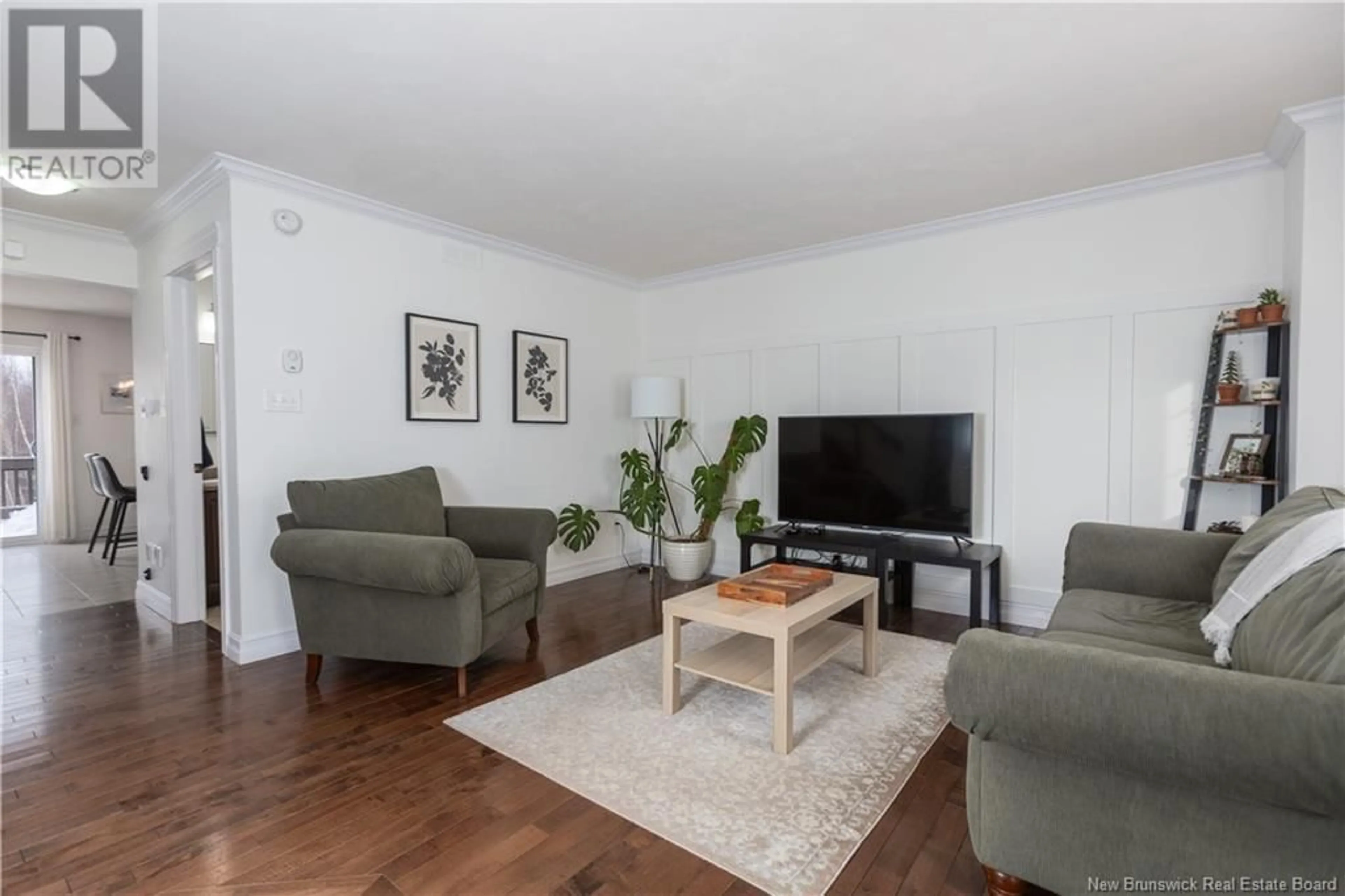 Living room with furniture, wood/laminate floor for 39 Oxiard Street, Dieppe New Brunswick E1A6A6