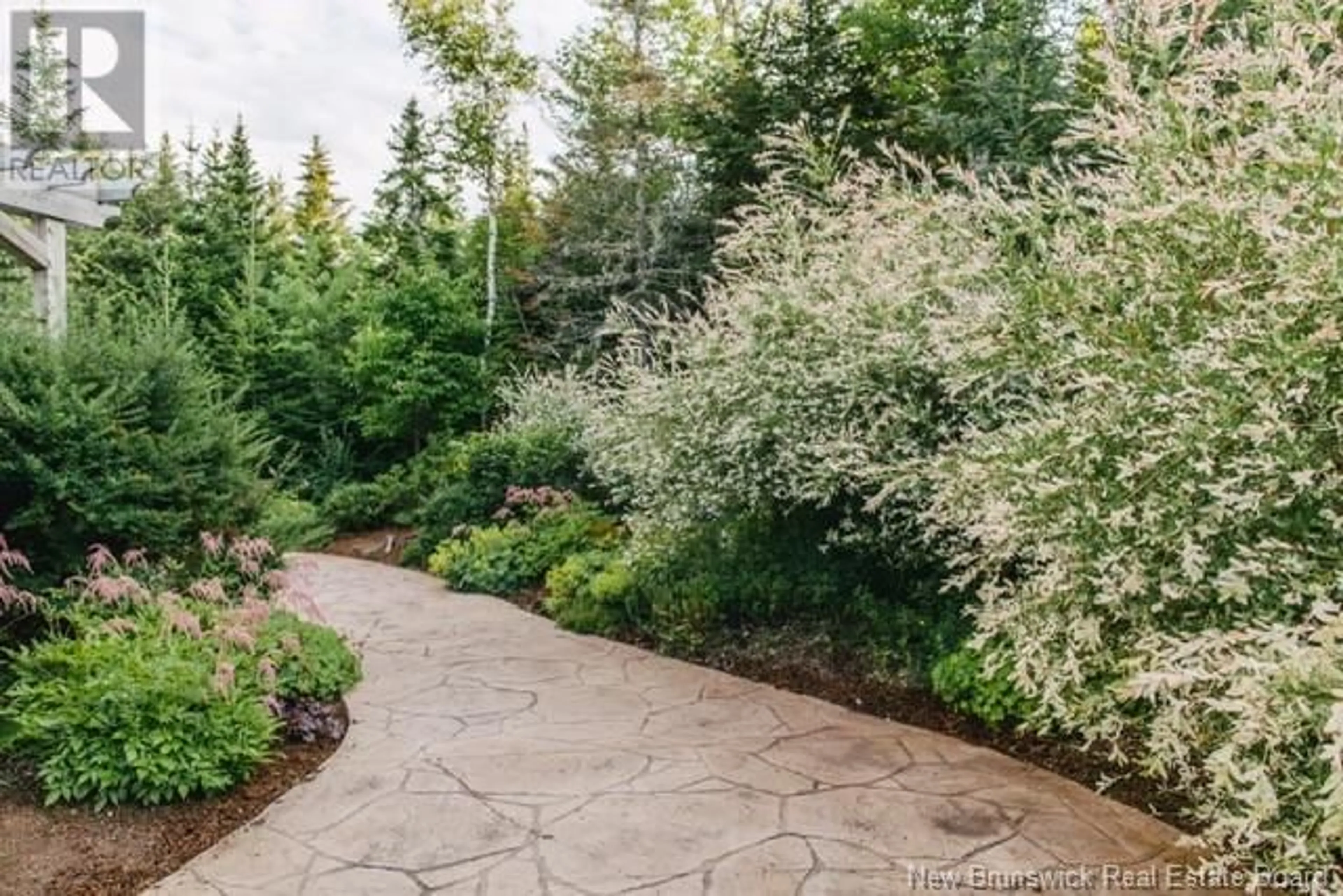 Patio, forest/trees view for 20 Carlton Drive, Quispamsis New Brunswick E2G0C3