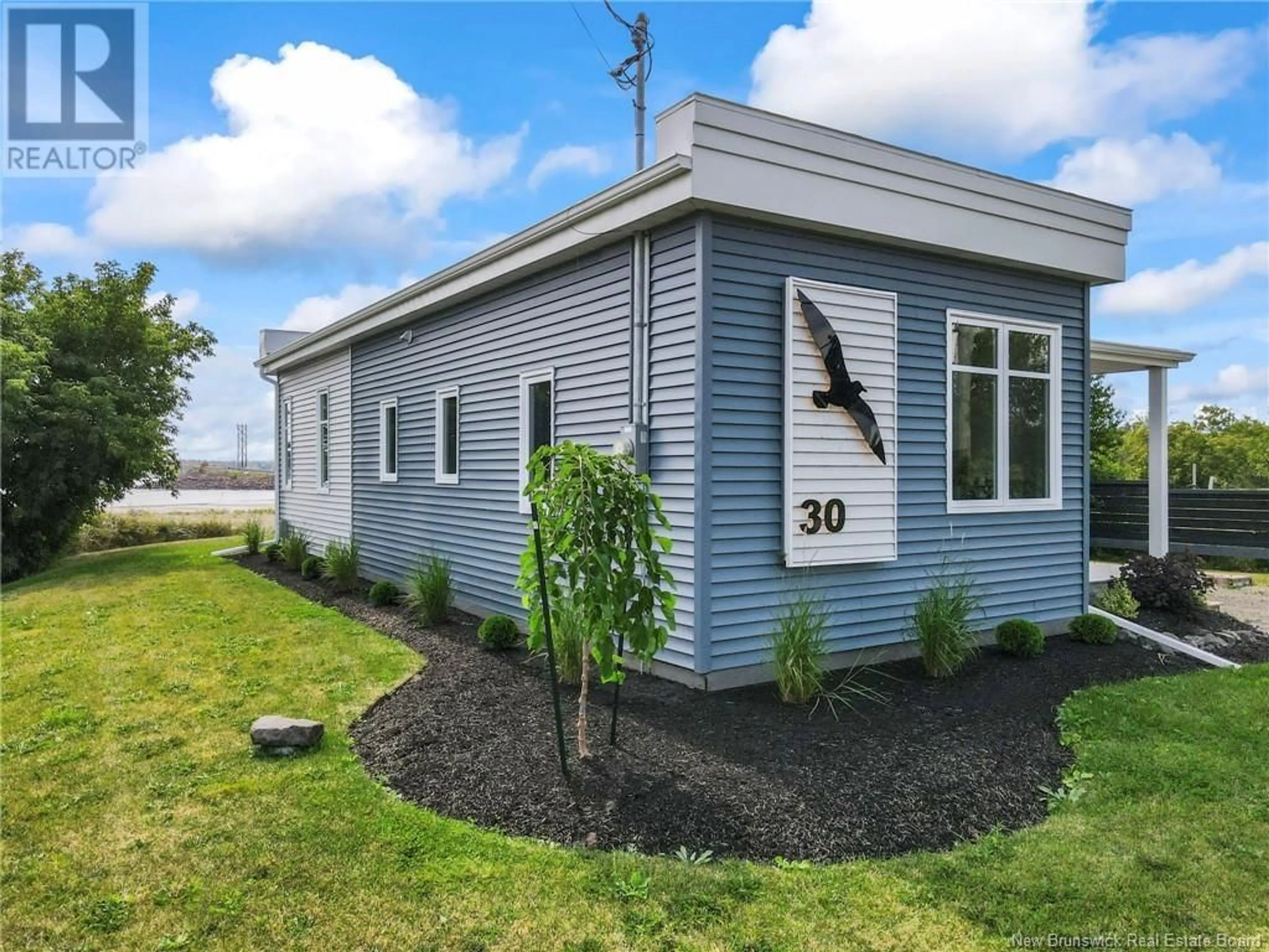 Home with vinyl exterior material, unknown for 30 Acadie Street, Cocagne New Brunswick E4R5Y6