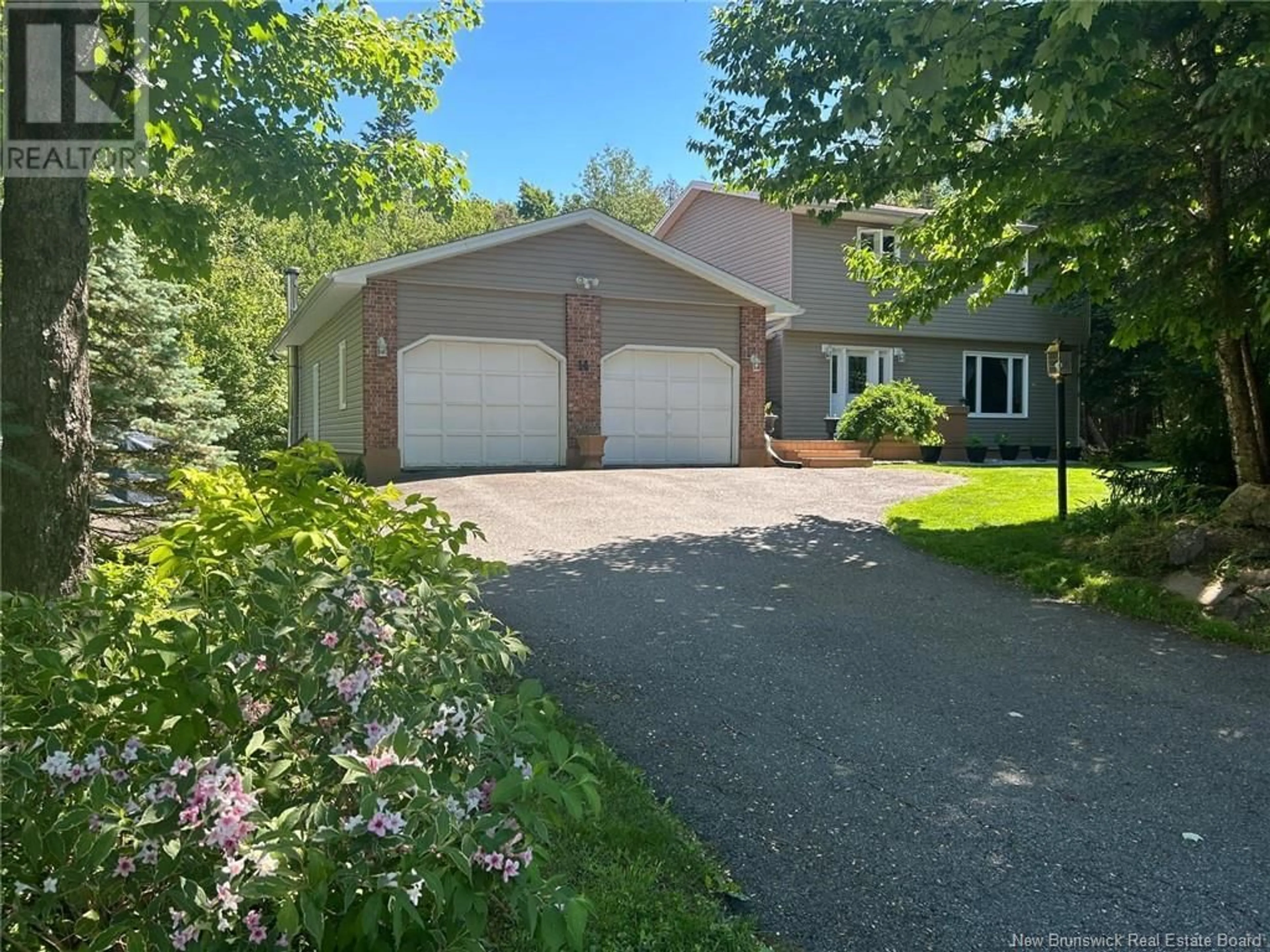 A pic from outside/outdoor area/front of a property/back of a property/a pic from drone, street for 14 Cliff Street, Quispamsis New Brunswick E2G1Y4